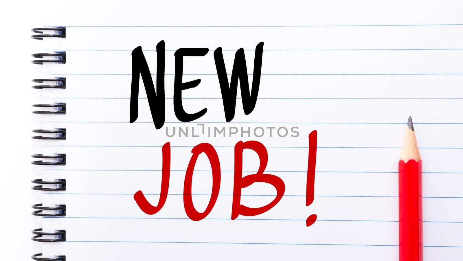 NEW JOB written on notebook page with red pencil on the right