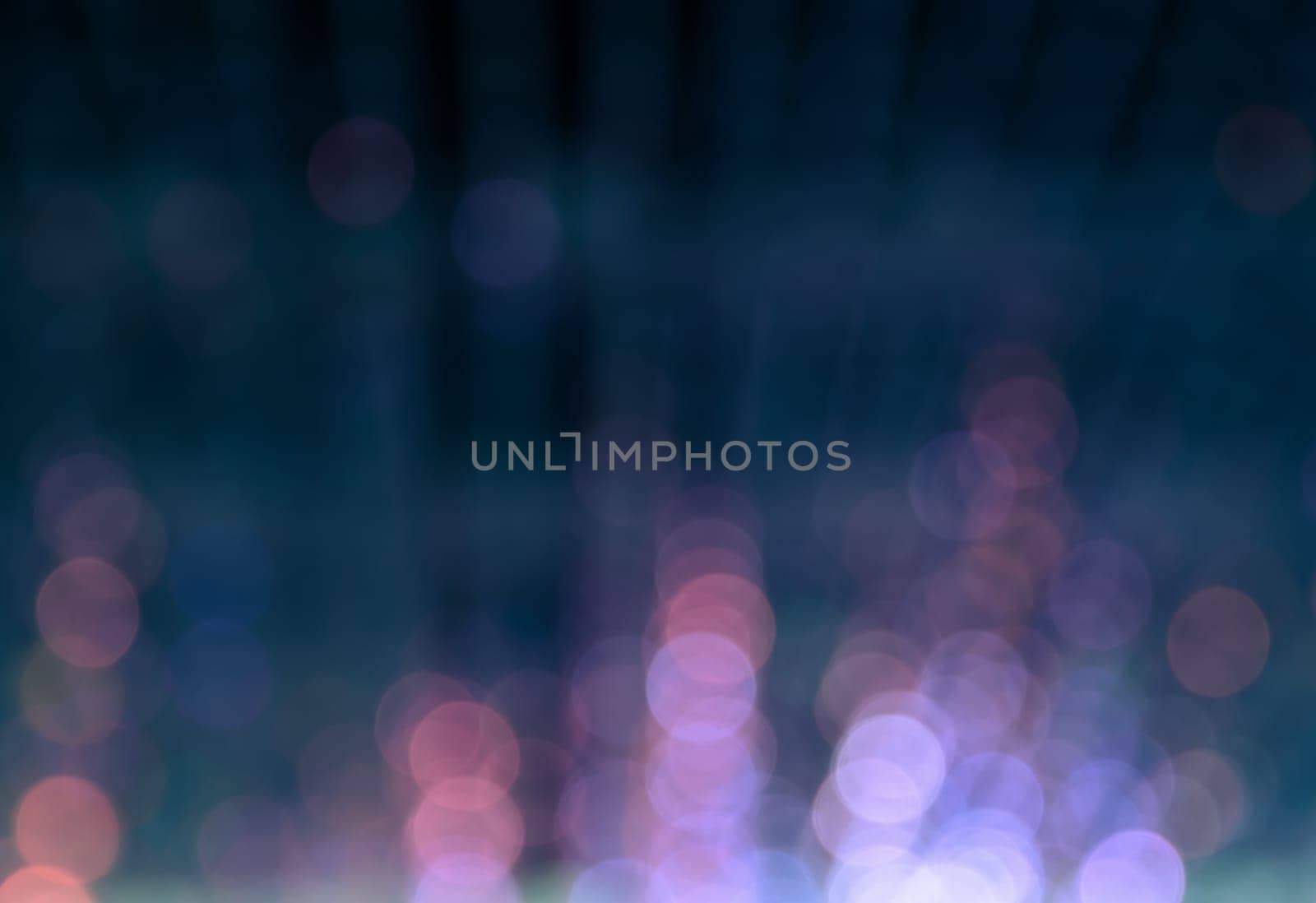 Abstract blurred color lights bokeh background. holidays, party and celebration concept.