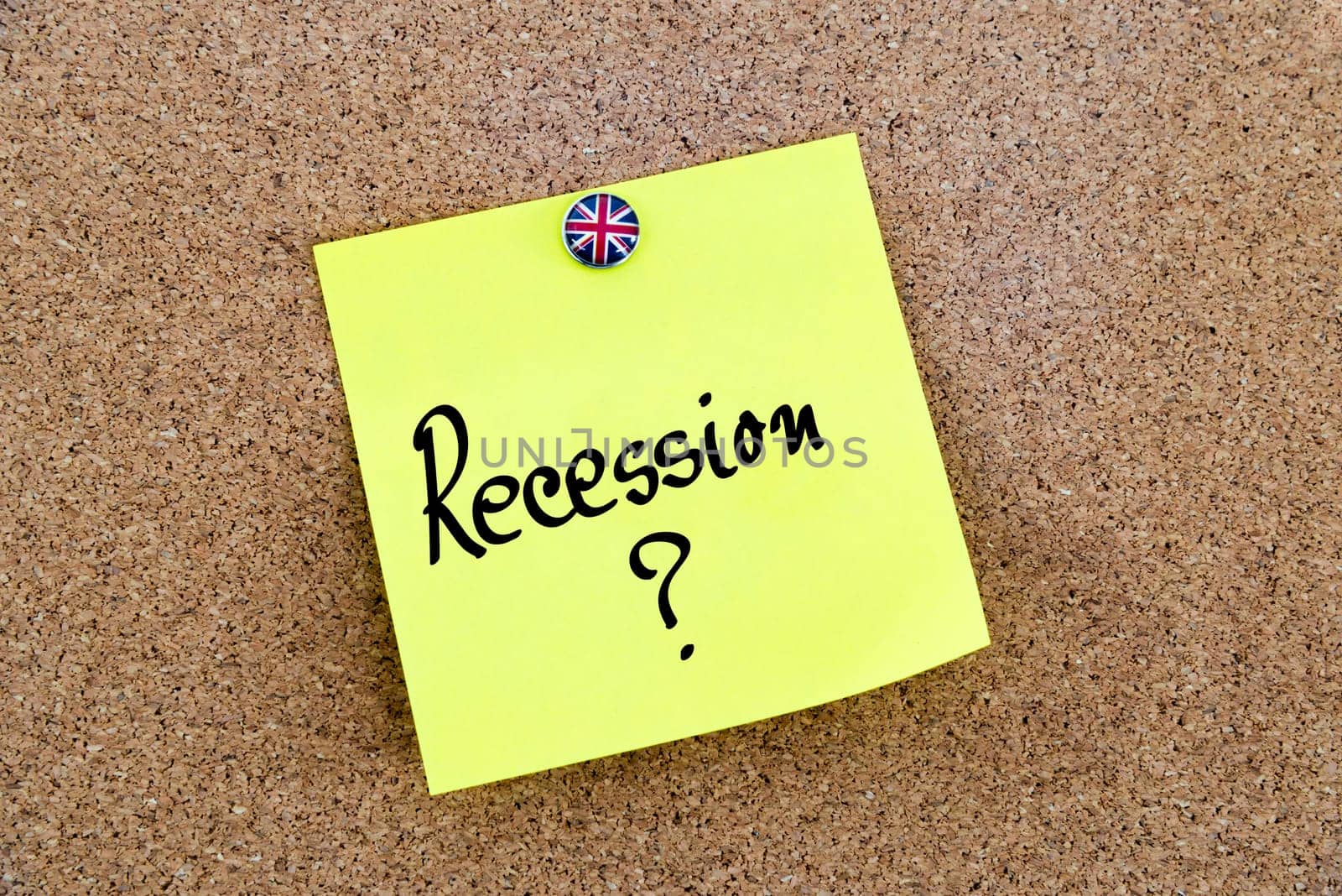 Yellow paper note pinned on cork board with Great Britain flag thumbtack, written text RECESSION ?, United Kingdom exit from European Union concept
