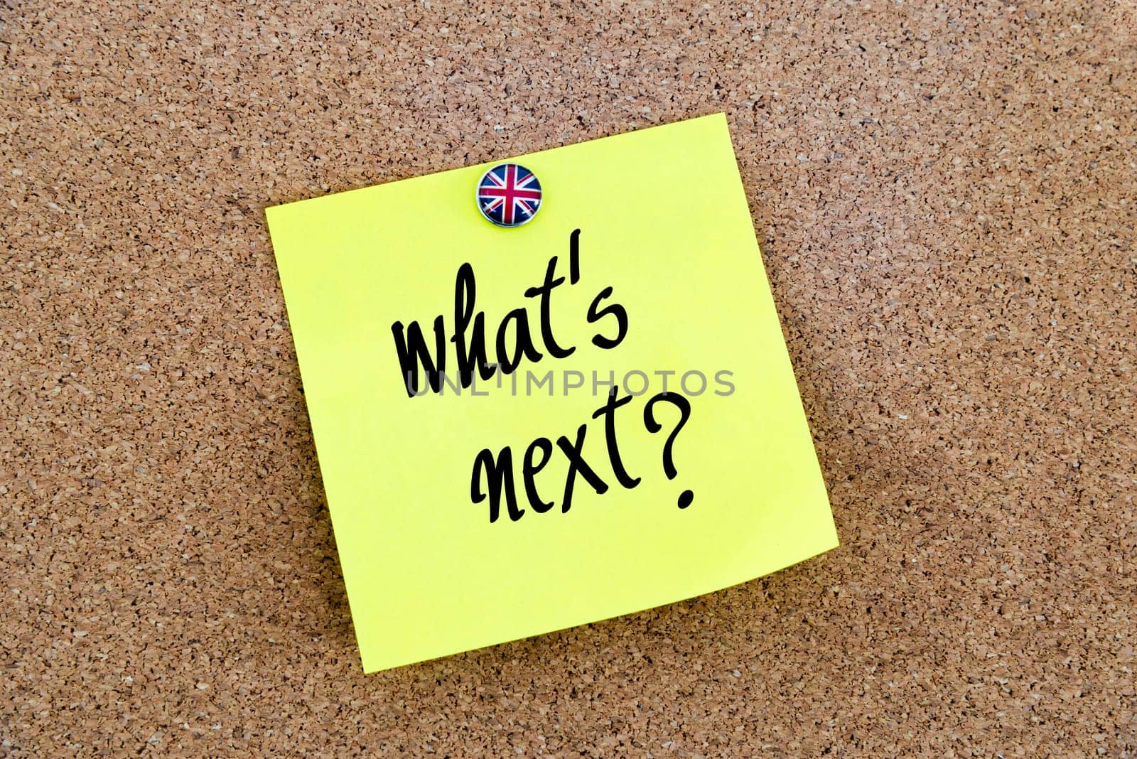 Yellow paper note pinned on cork board with Great Britain flag thumbtack, written text What Is Next ?, United Kingdom exit from European Union