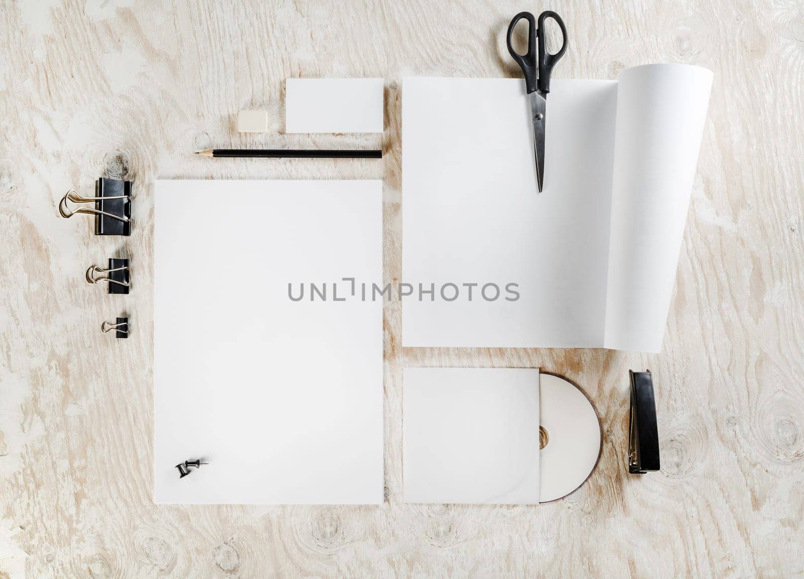 Blank stationery set on wooden table background. Blank ID template. Mockup for branding identity for designers. Mock-up for your design.