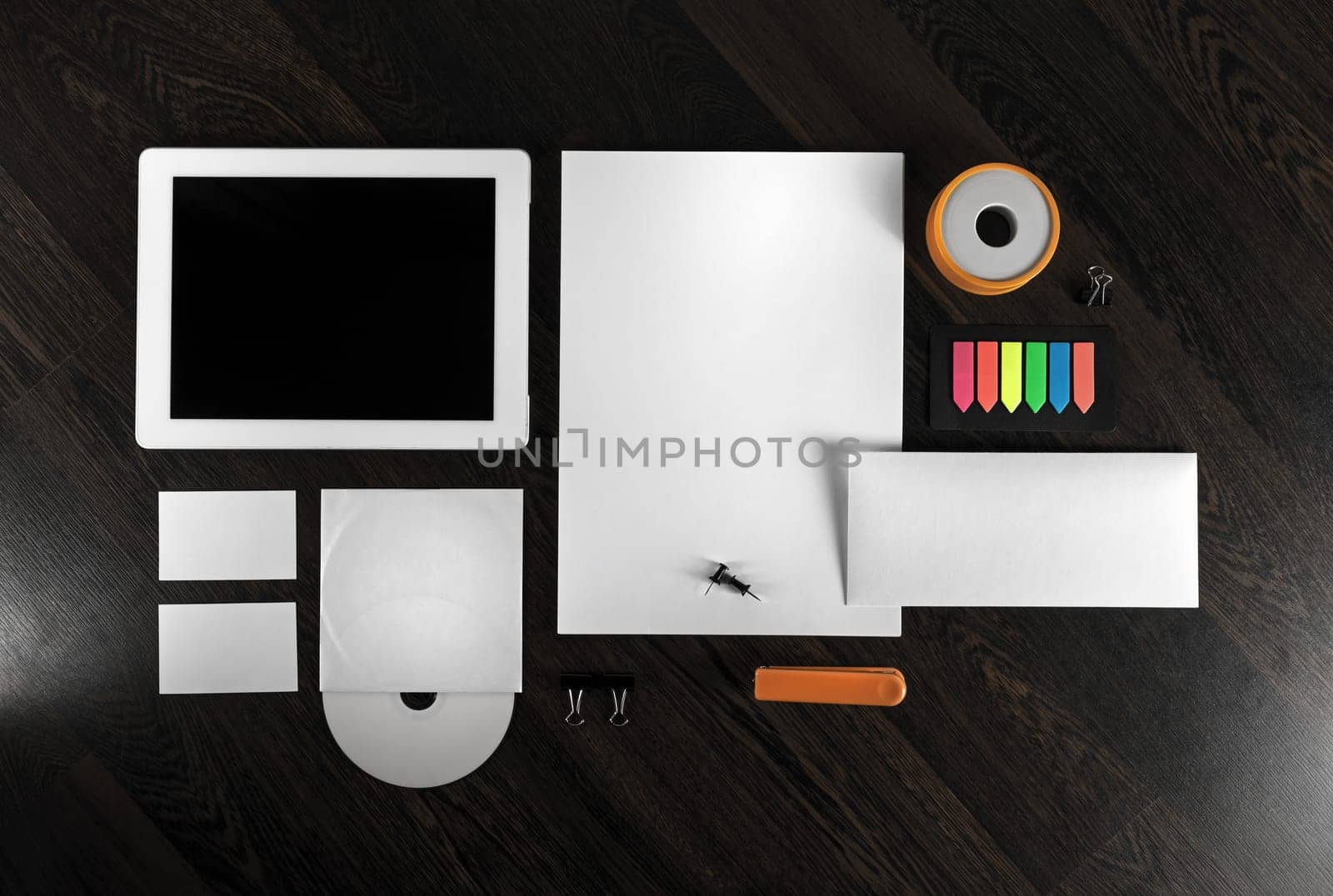 Corporate identity template on wooden background. Top view.
