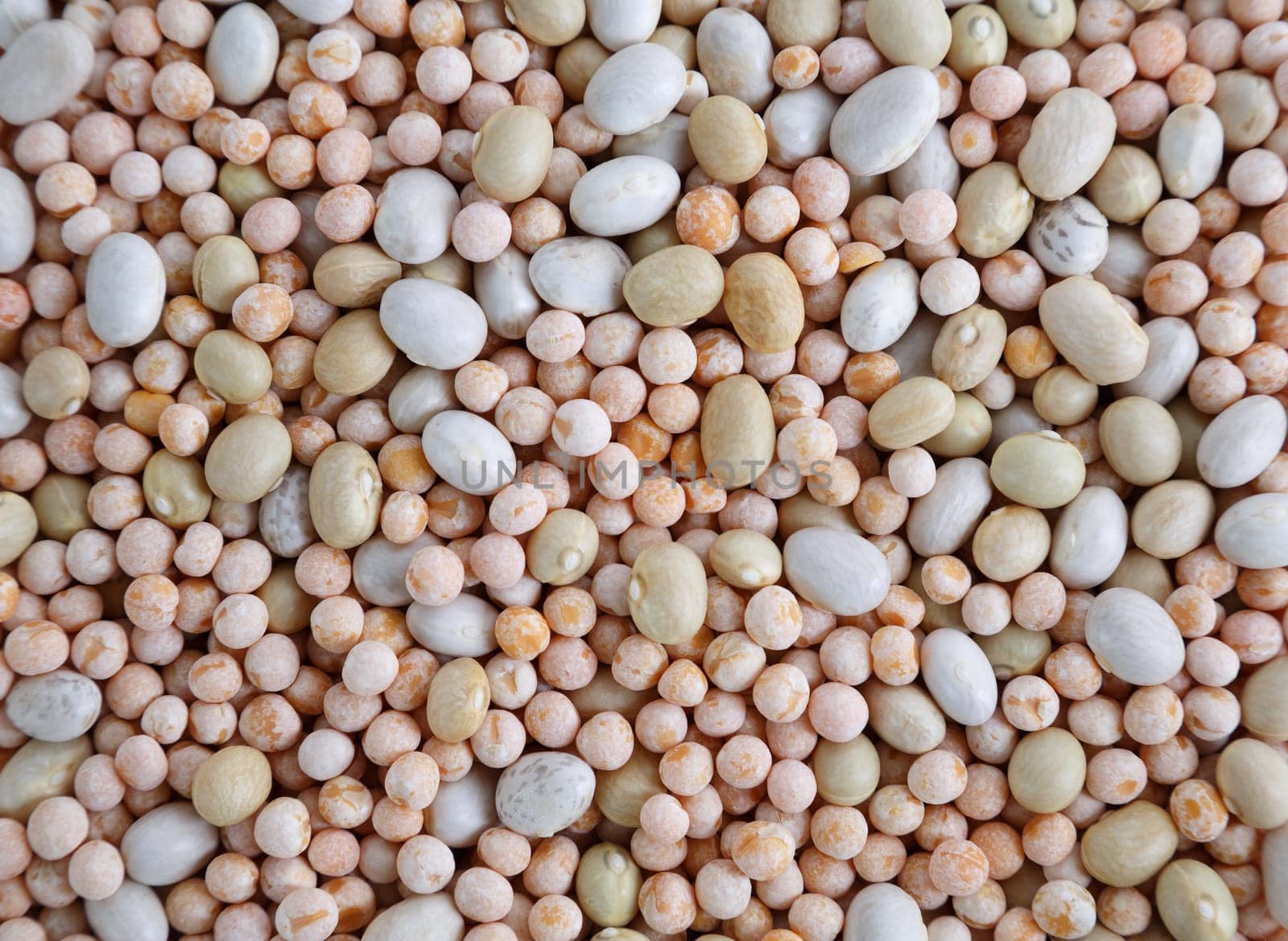 Peas and haricot. Mixed dried beans top view. Abstract background texture.