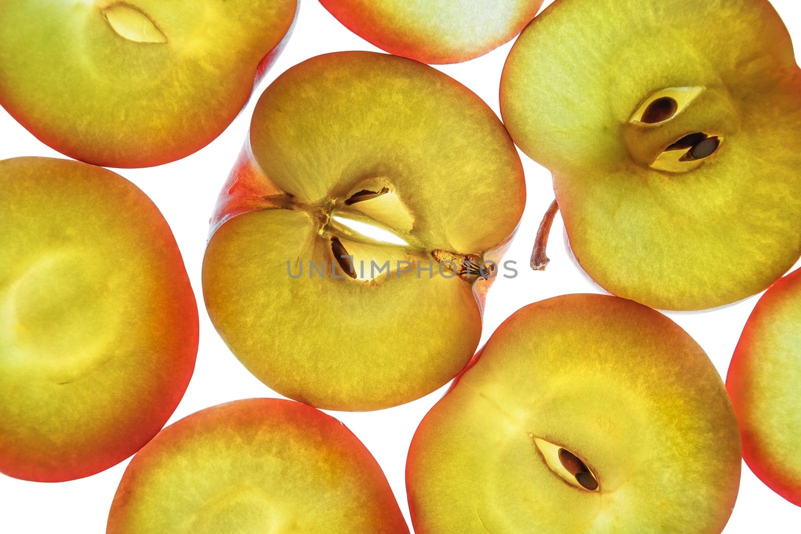 Fresh delicious apples, cut into pieces. Close-up.