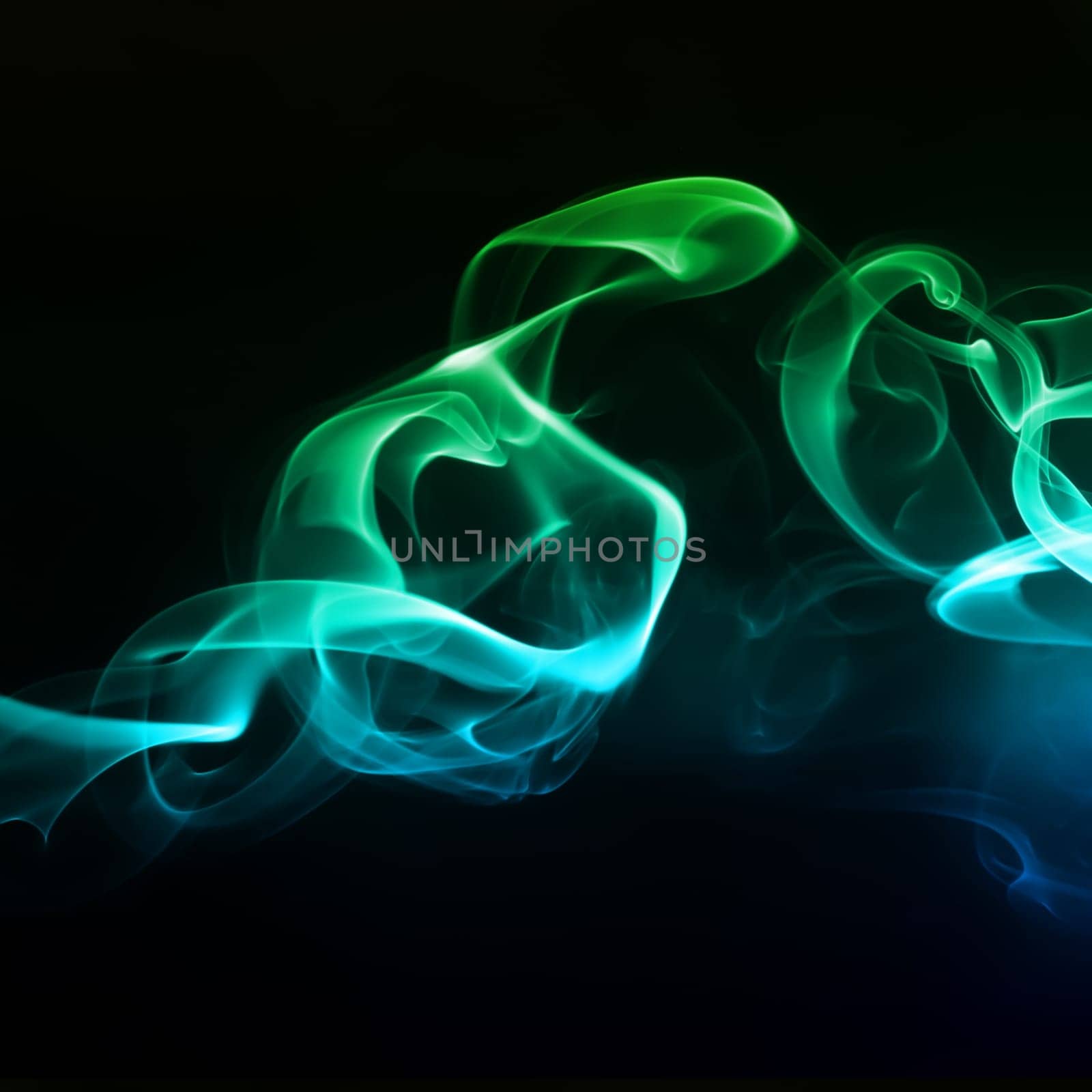 Abstract bright colored smoke on a dark background.