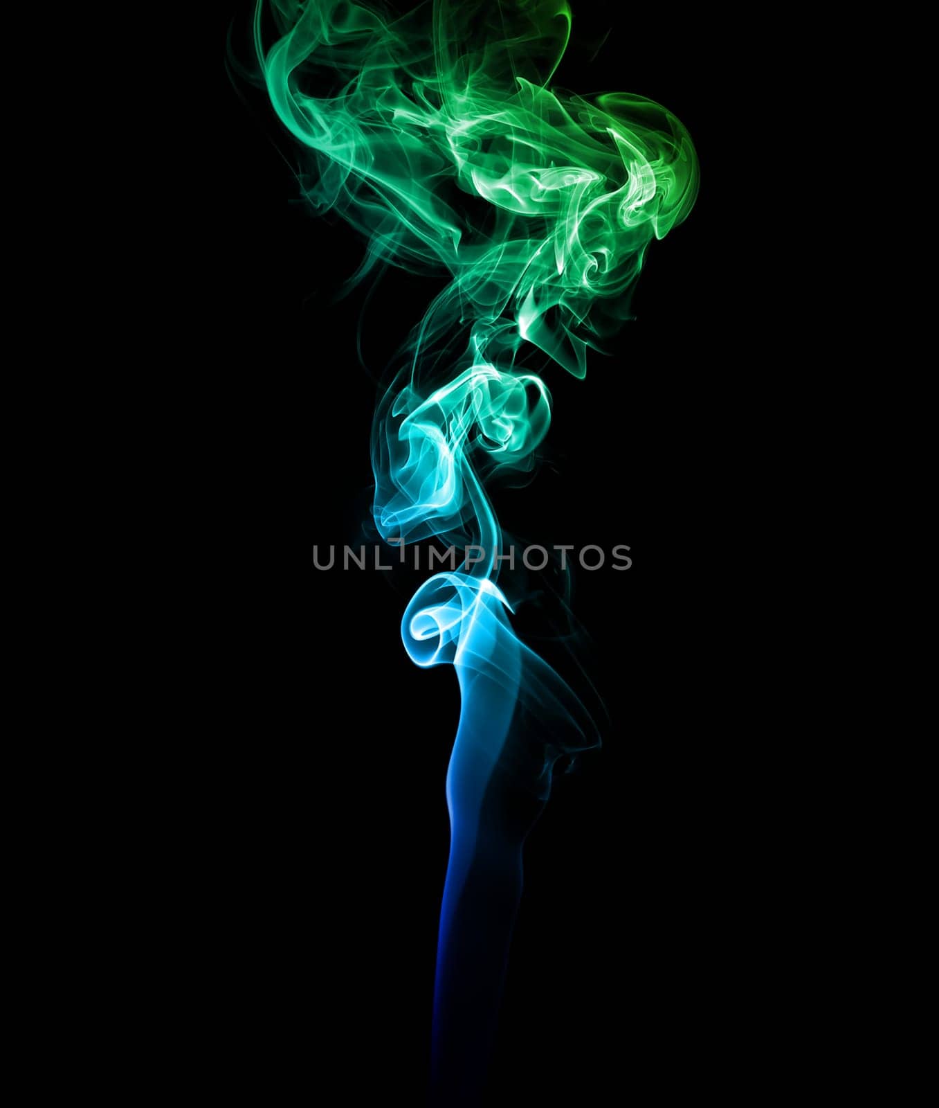Abstract blue and green smoke on a dark background.