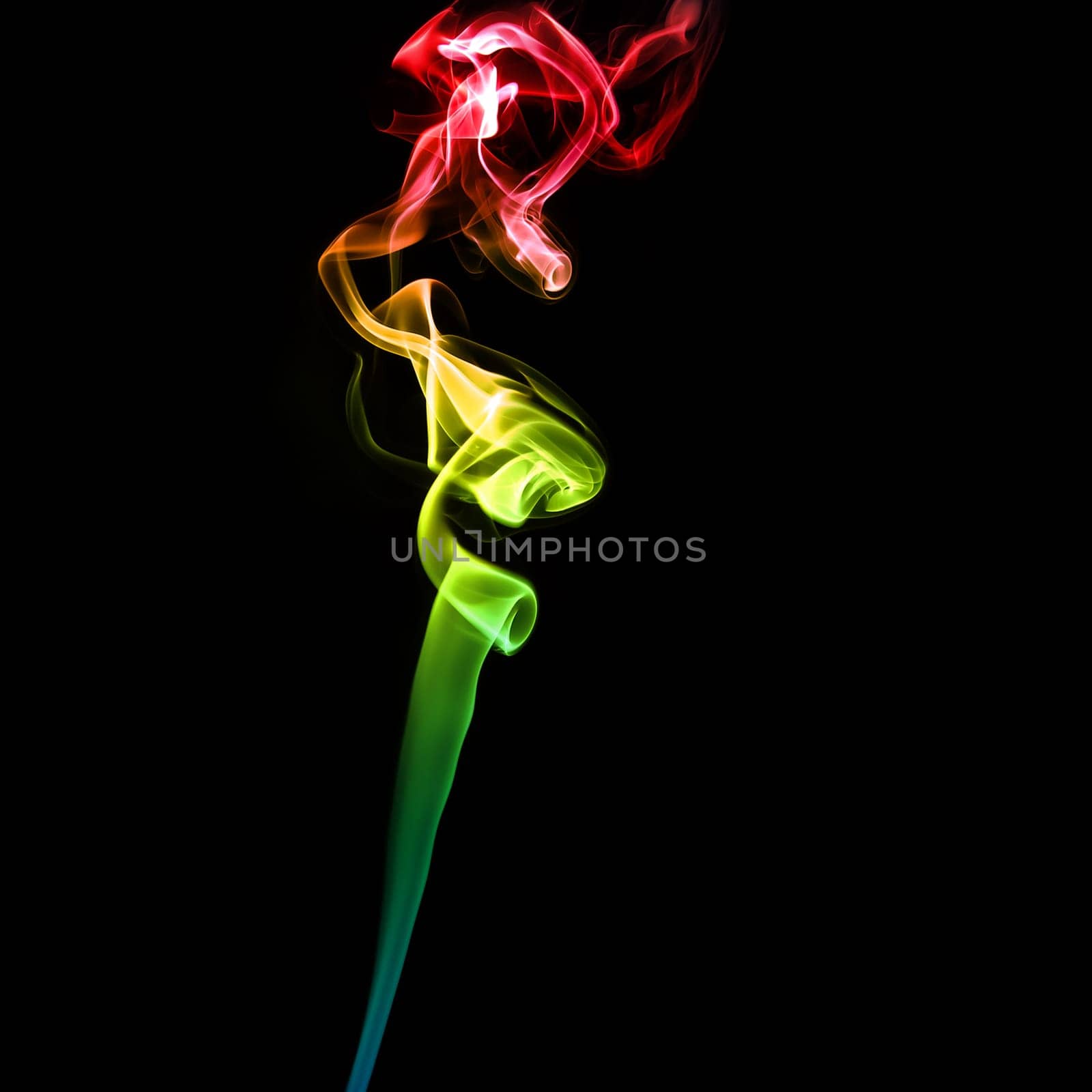 Abstract bright colored smoke on a dark background.