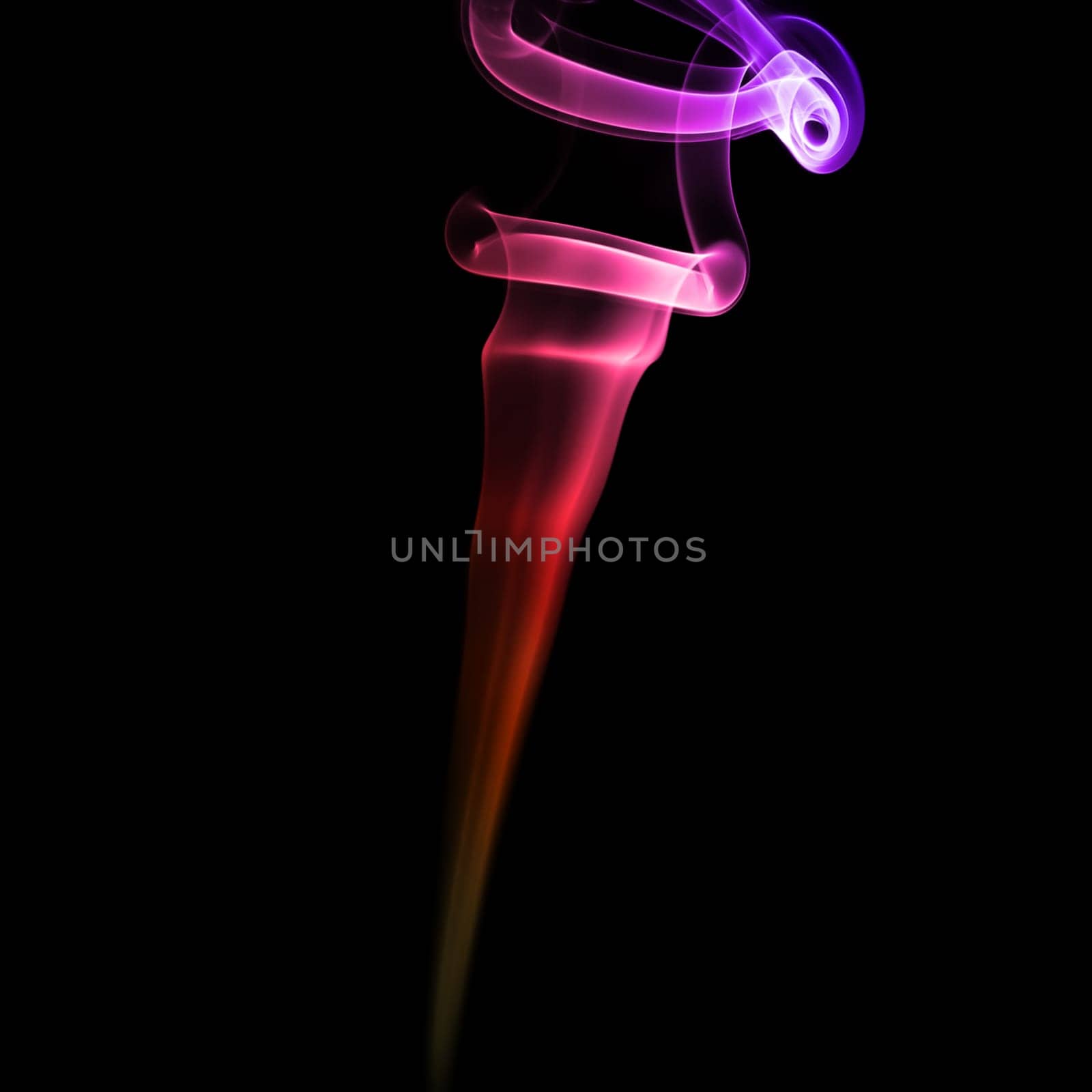 Abstract bright colored smoke on a dark background.
