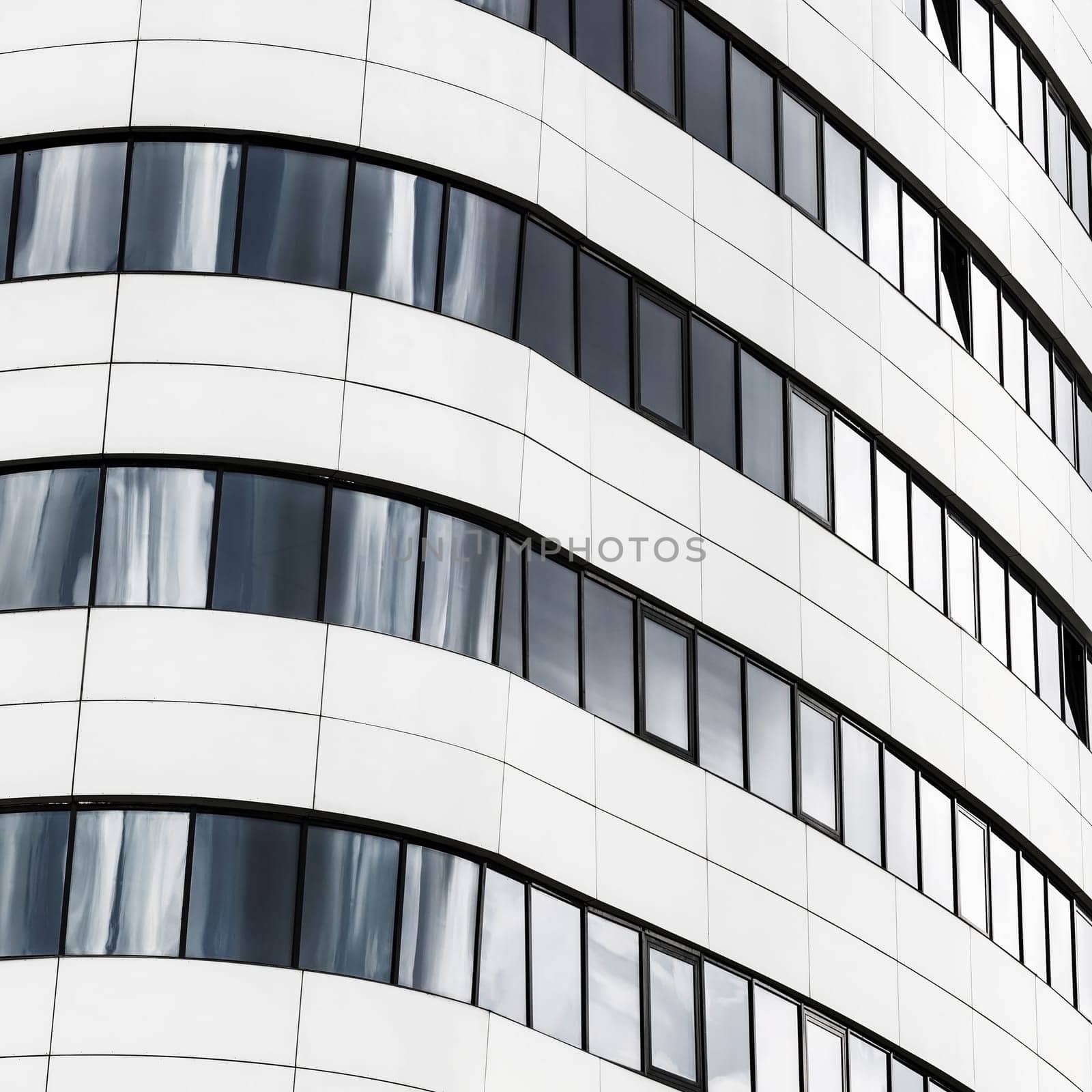 Fragment of modern architecture. Close-up view of the modern building. Modern business industrial architecture.