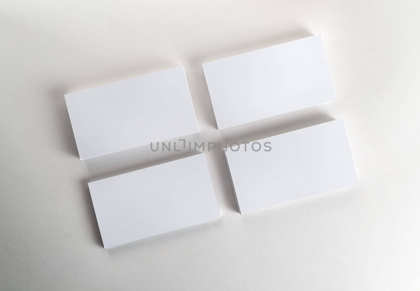 Blank business cards on the table. Template for ID. Top view.