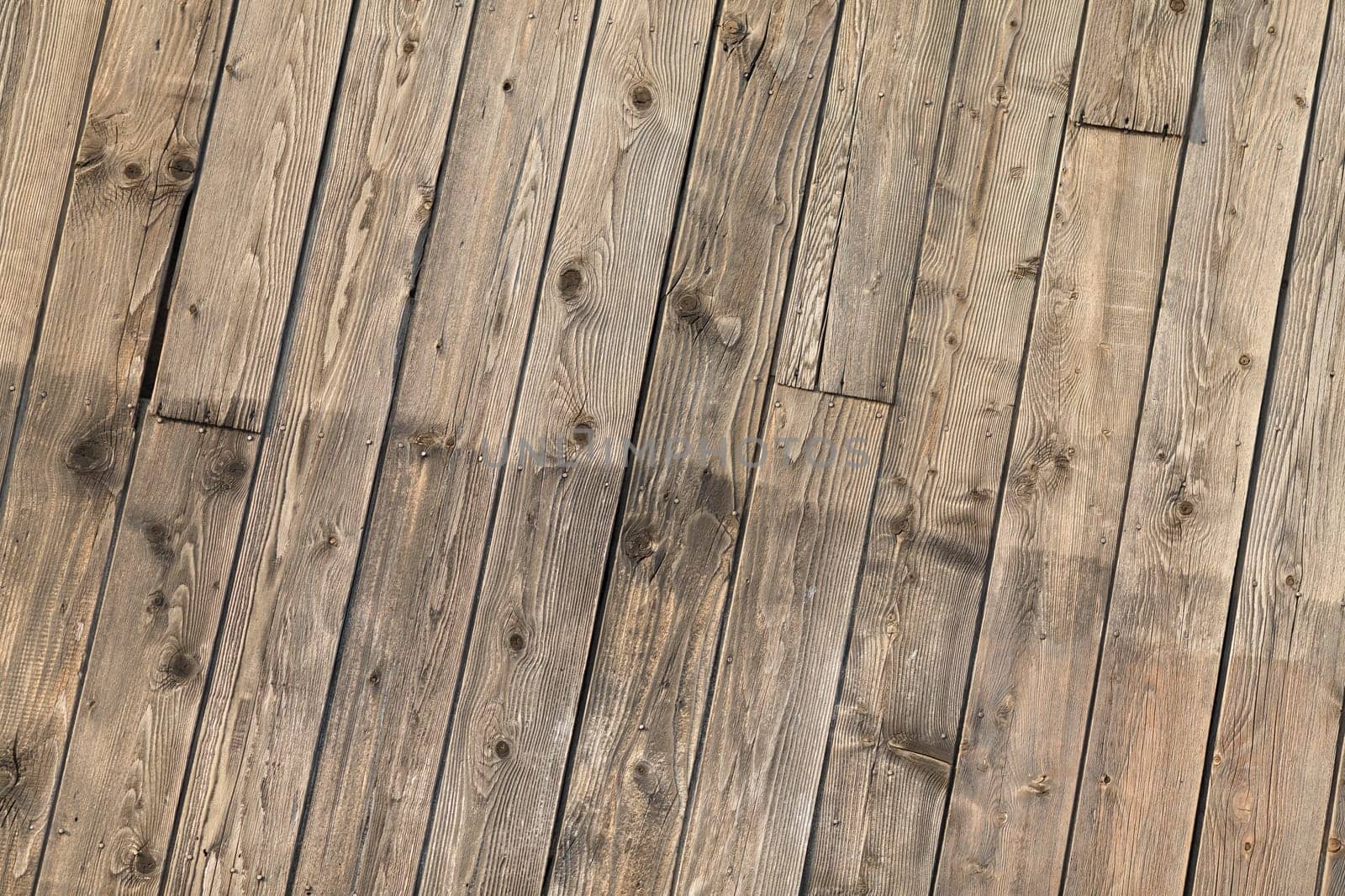 Wooden plank brown texture background. Front view.