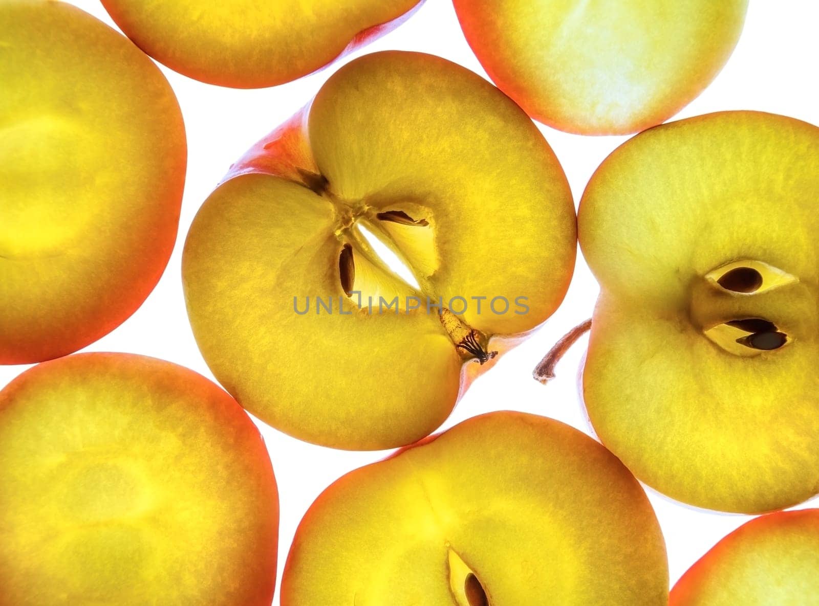 Fresh delicious apples, cut into slices. Close up.
