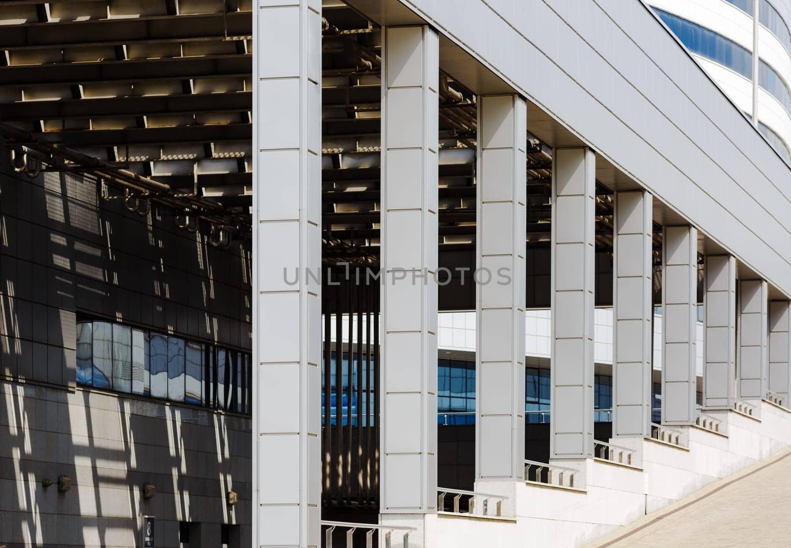 MINSK, BELARUS - MAY 03, 2016: Minsk-Arena - a sports and entertainment complex in the city of Minsk, Belarus. Close-up of modern industrial architecture with a colonnade.
