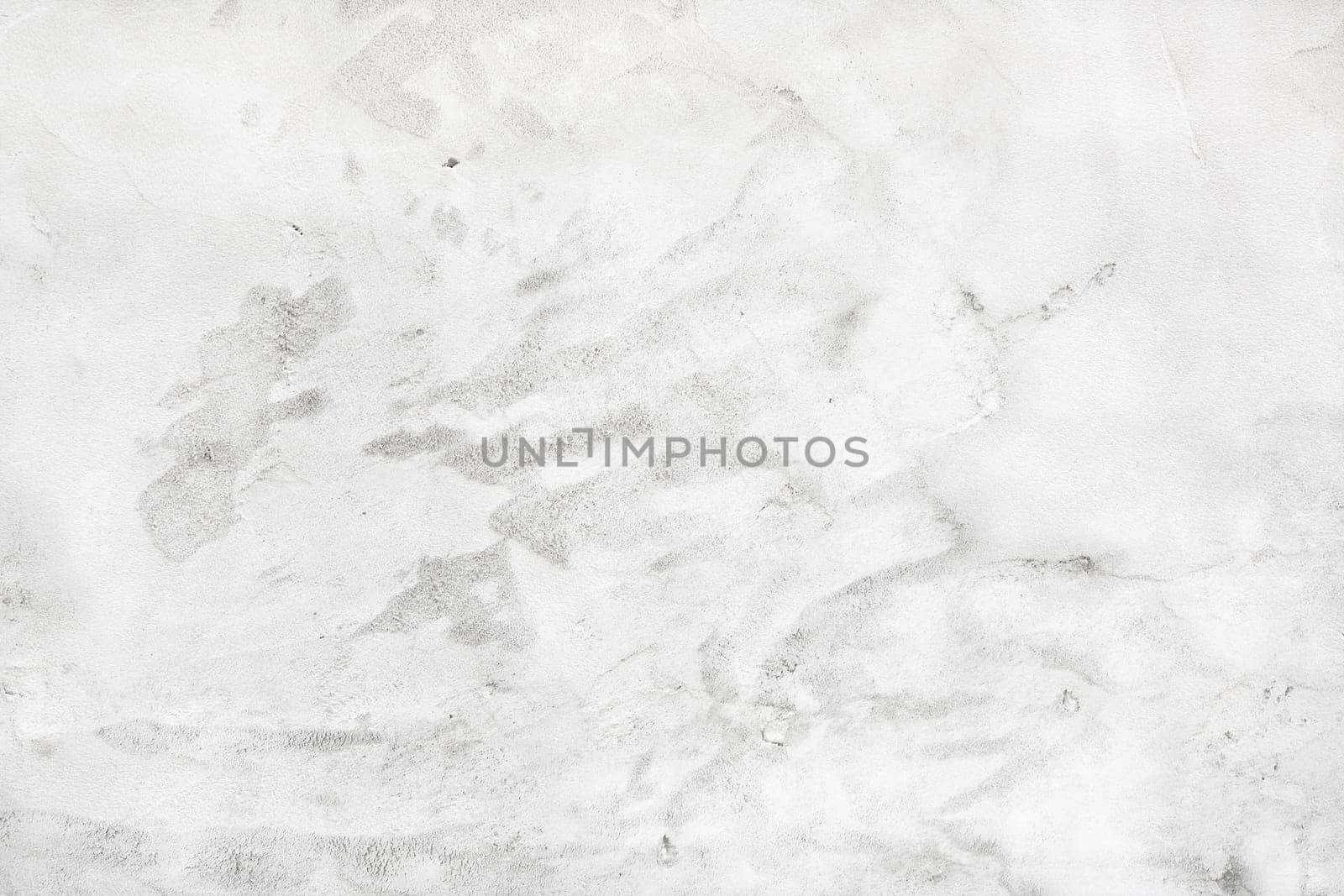 Abstract grunge background. Cement plaster. Old white concrete wall.