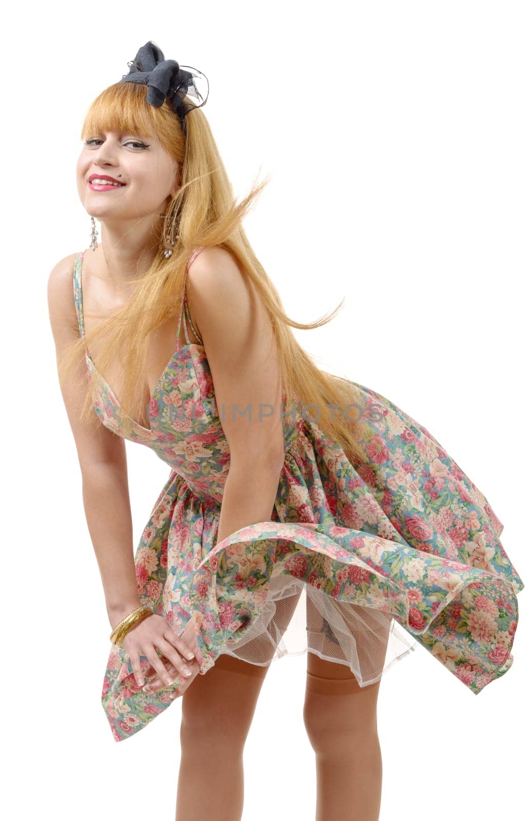 Young woman in retro floral dress, isolated on white background