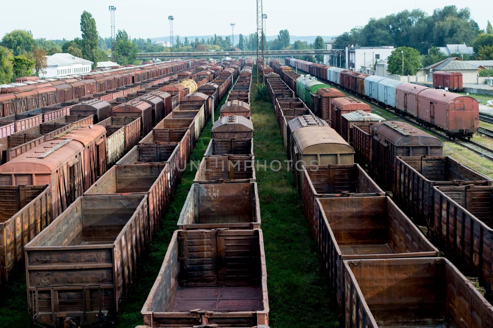 old cars at provincial railway station, a railway fork, railway tracks, a road subject