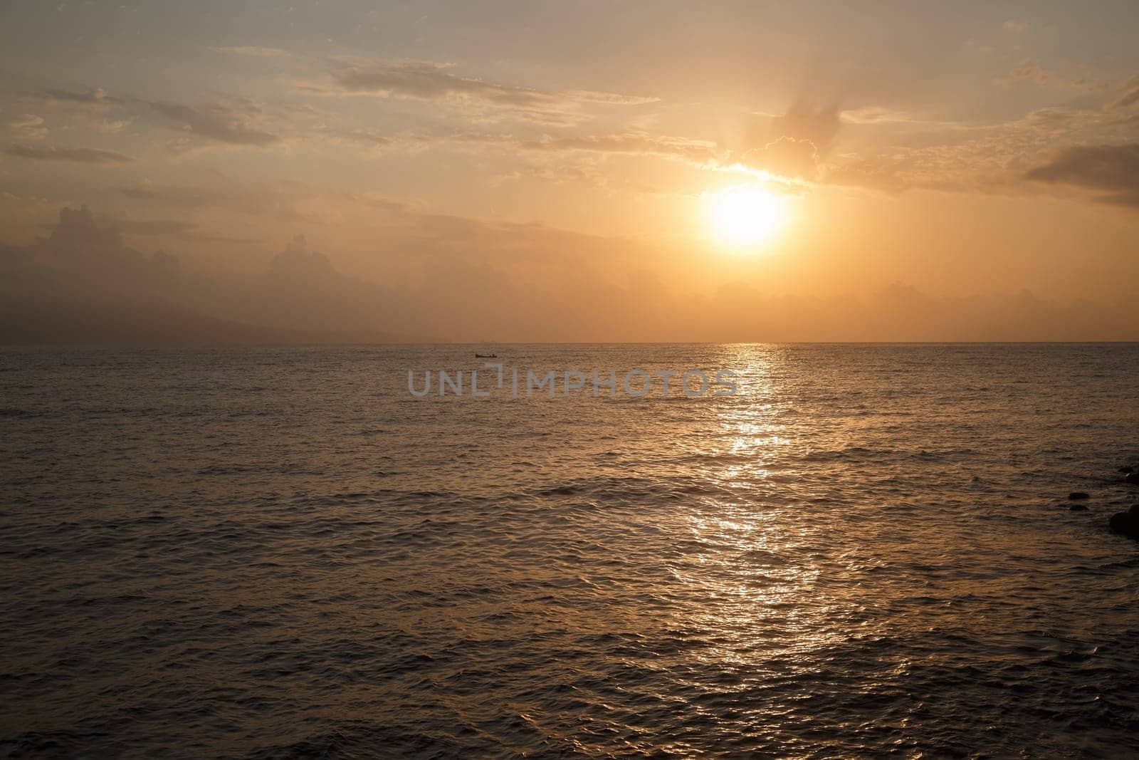 The reflection of the sun in the sea at dawn