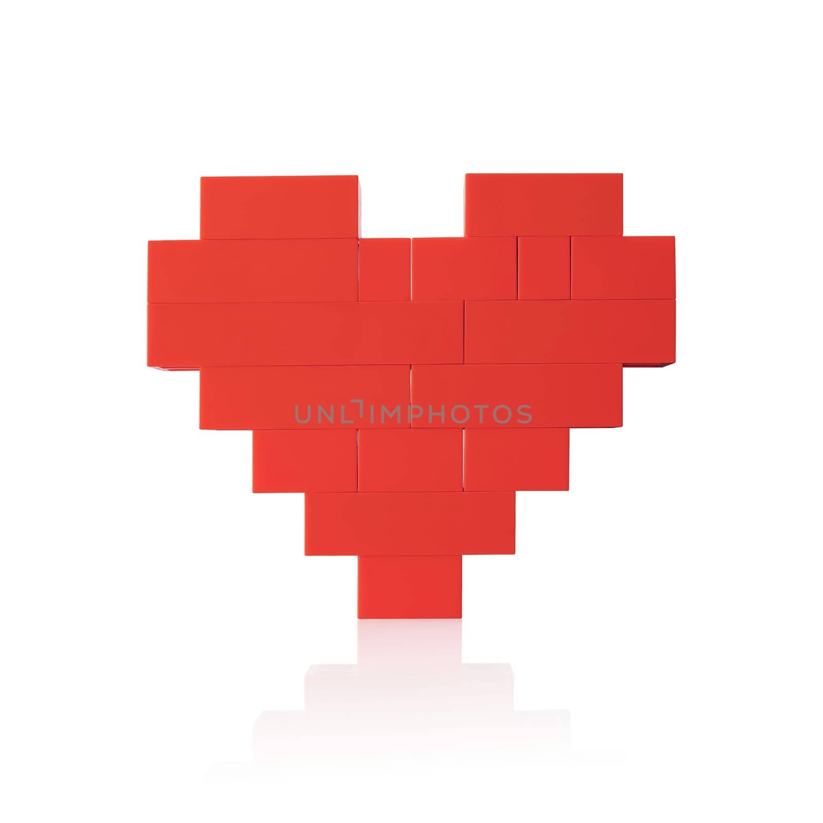 Heart made of red plastic blocks. Isolated on white background.