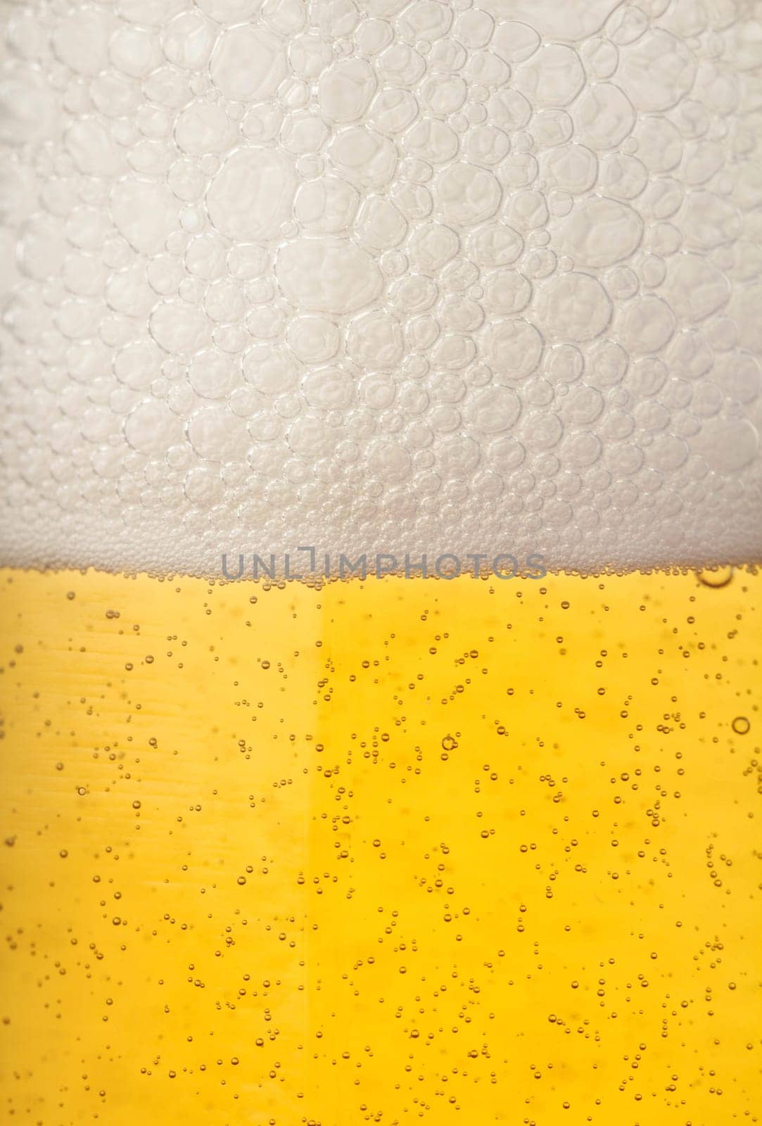 Close up of beer pearls, adding up to froth