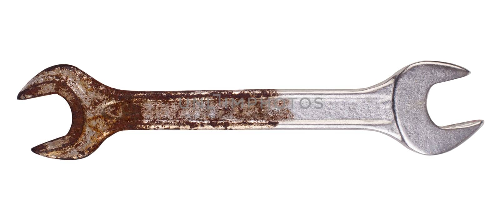 A wrench rusted on one side while still stainless on the other