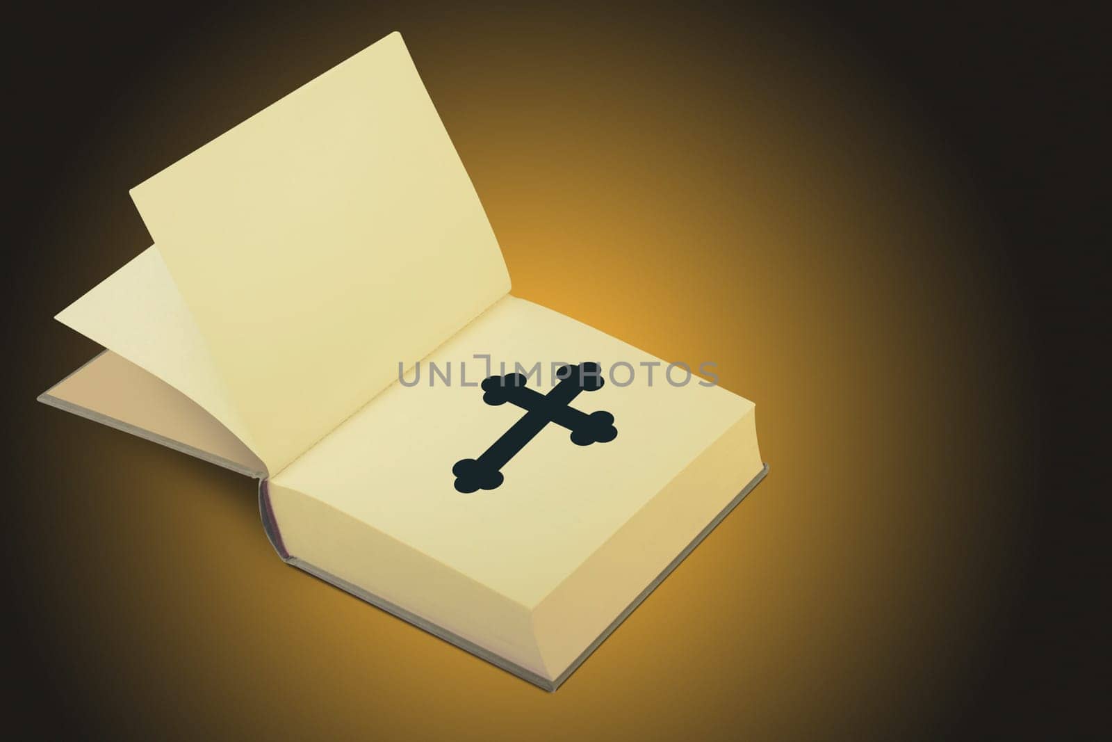 Open book with a Christian cross on the first page