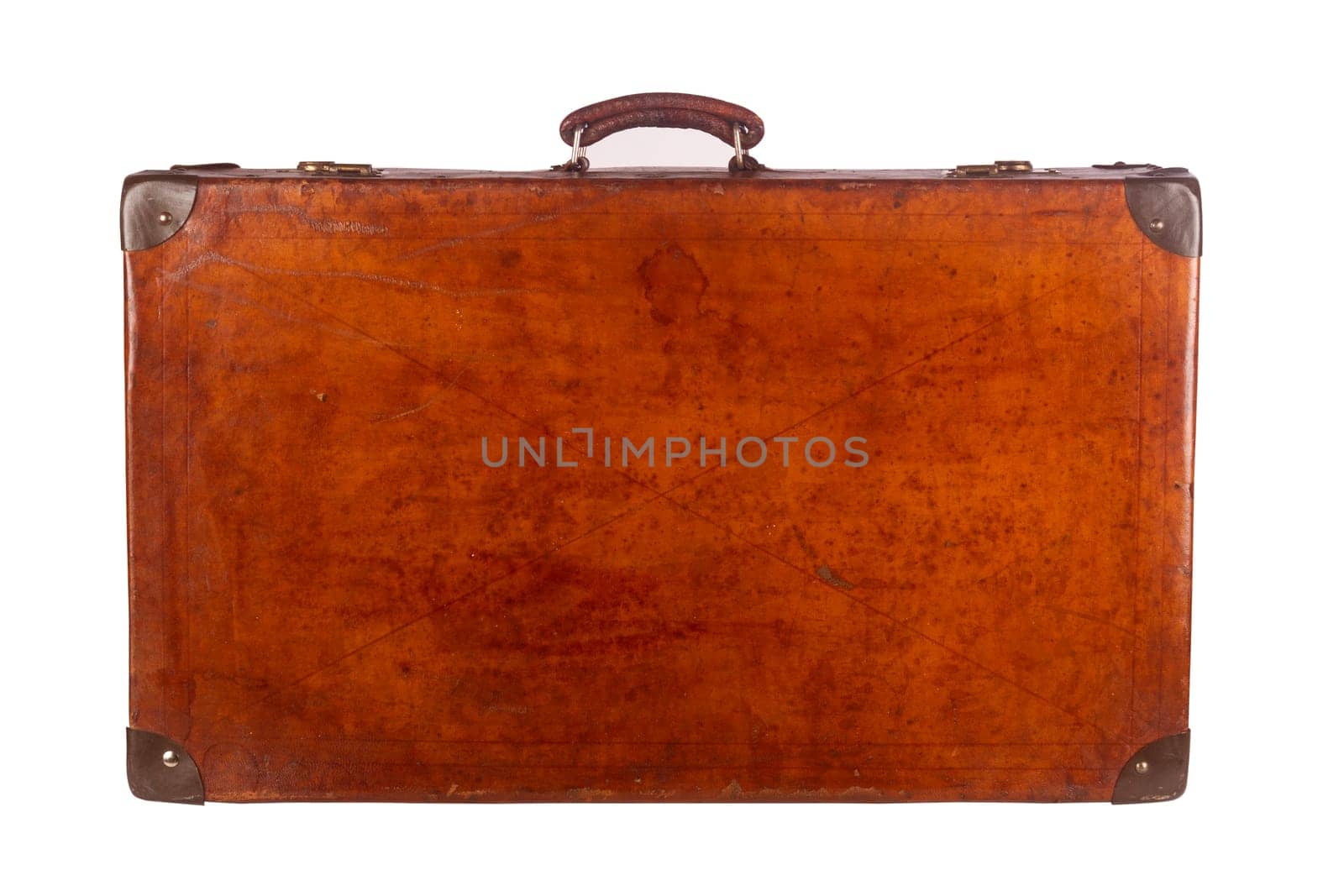 Old closed vintage suitcase viewed from the front isolated on white background