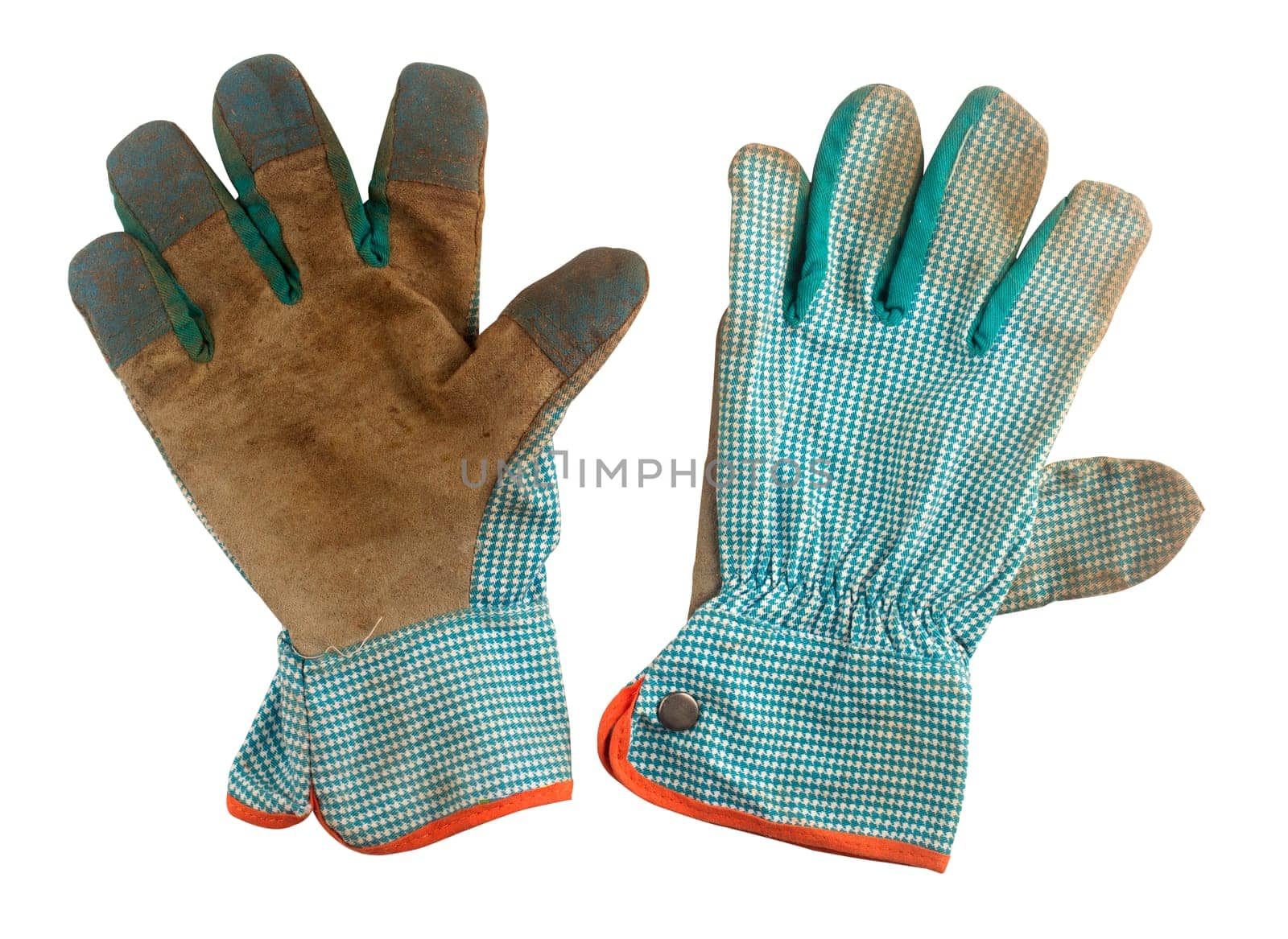 Pair of used gardening gloves isolated on white background