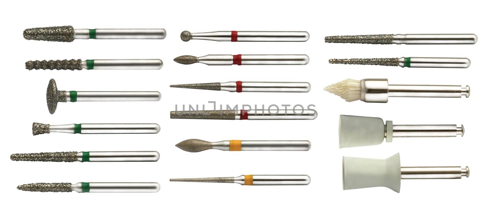 Complete set of chrome dentist drills, viewed from the top isolated on white background