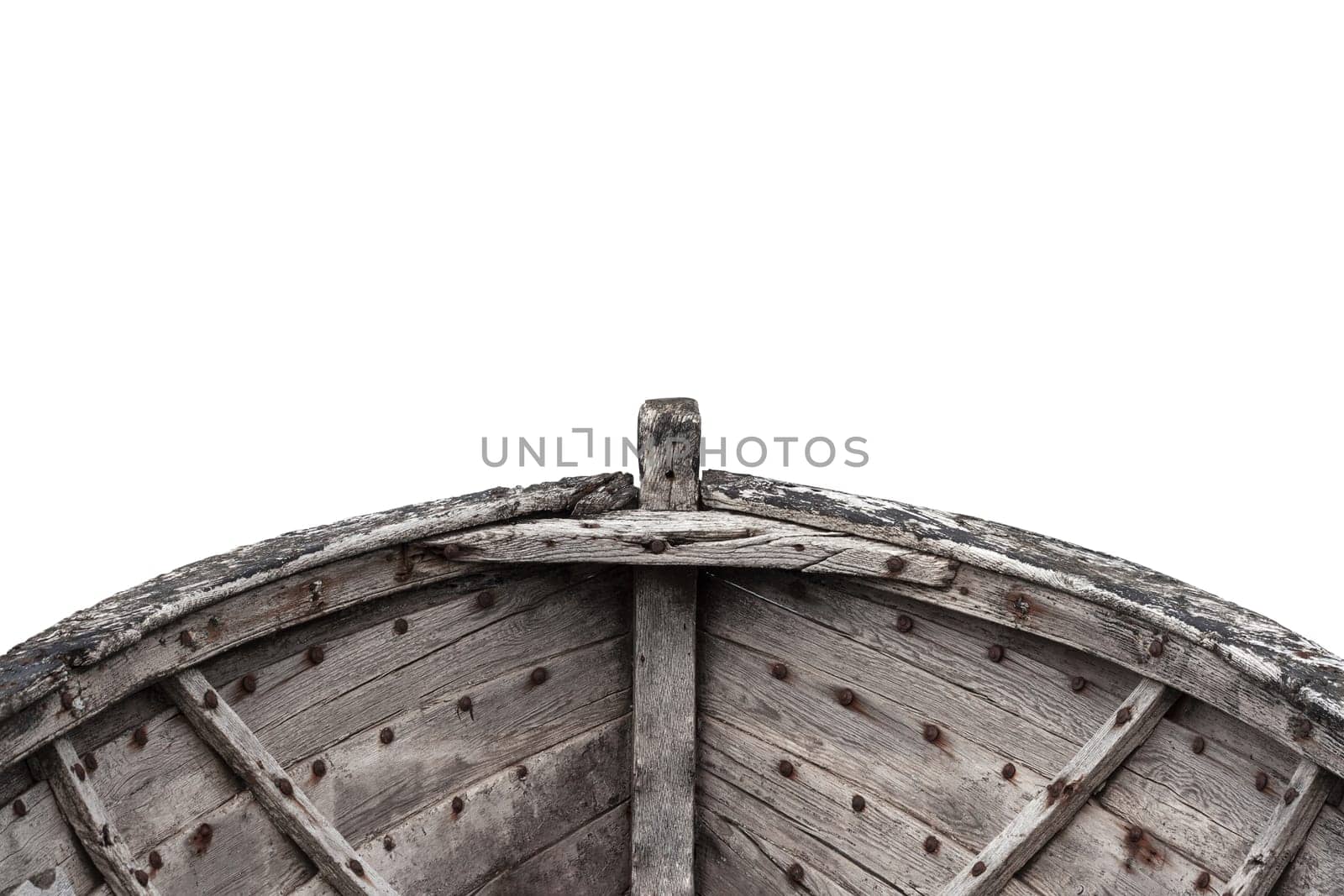 Horizontal photo of an old fishing wood boat with rusted nails isolated on white background