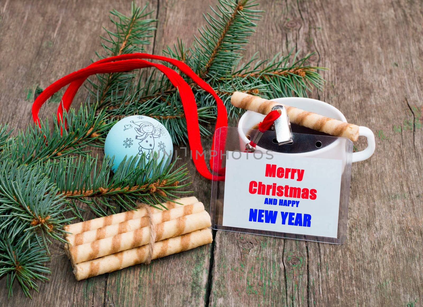 coniferous branch, linking of cookies, coffee and label with an inscription Christmas, a still life the subject Christmas and New Year