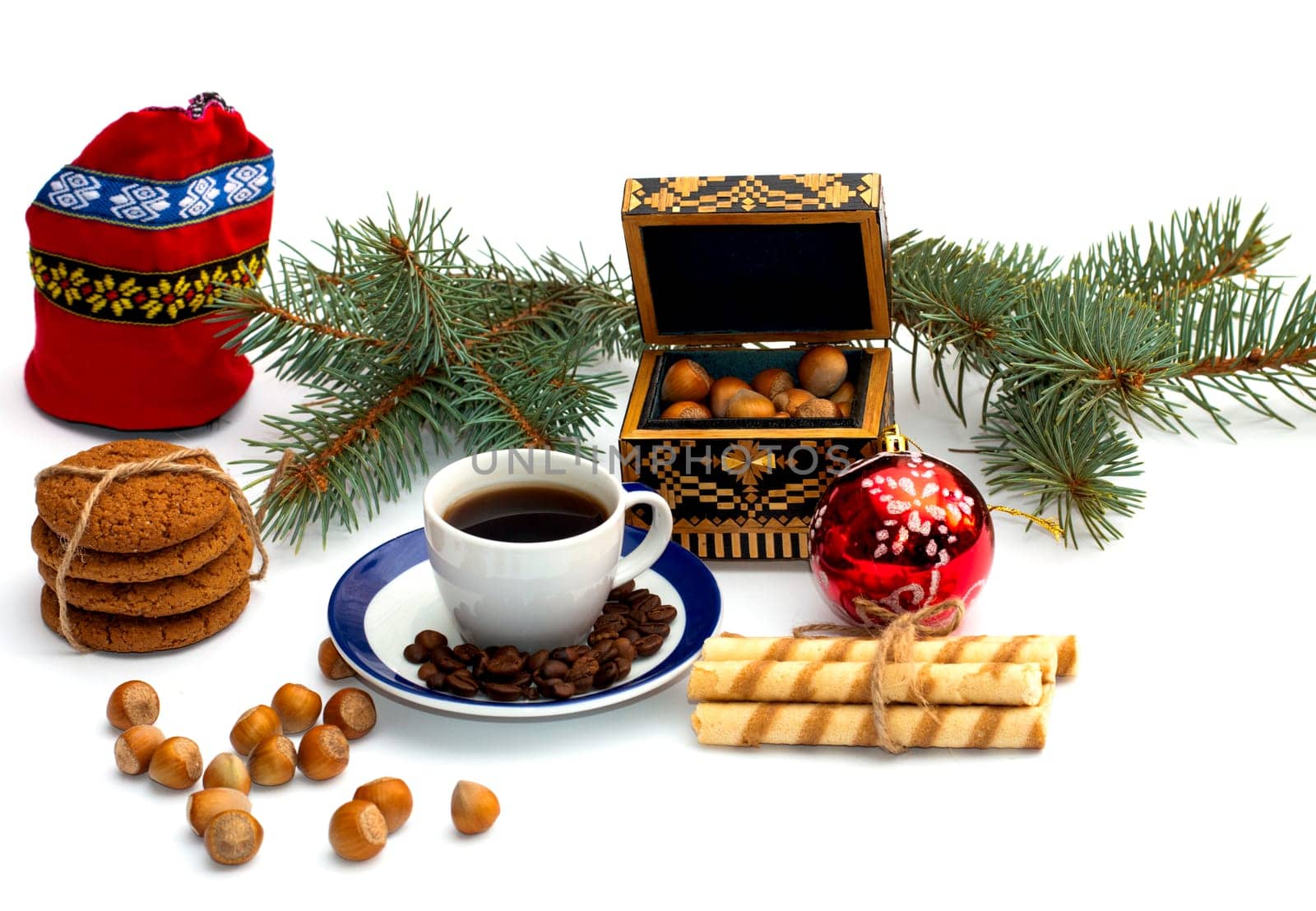red bag, coffee, fir-tree branch, casket and forest nutlets, subject hot drinks and sweets, holidays Christmas and New Year