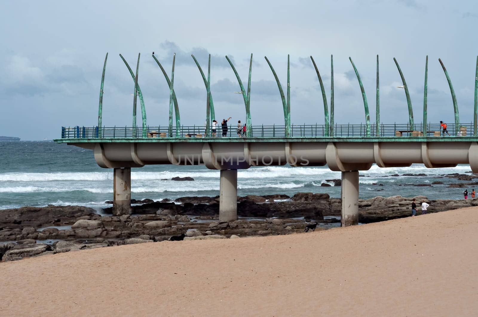 DURBAN, SOUTH AFRICA - JULY 09, 2016: People on the Millennium Pier at the beach in Umhlanga Rocks