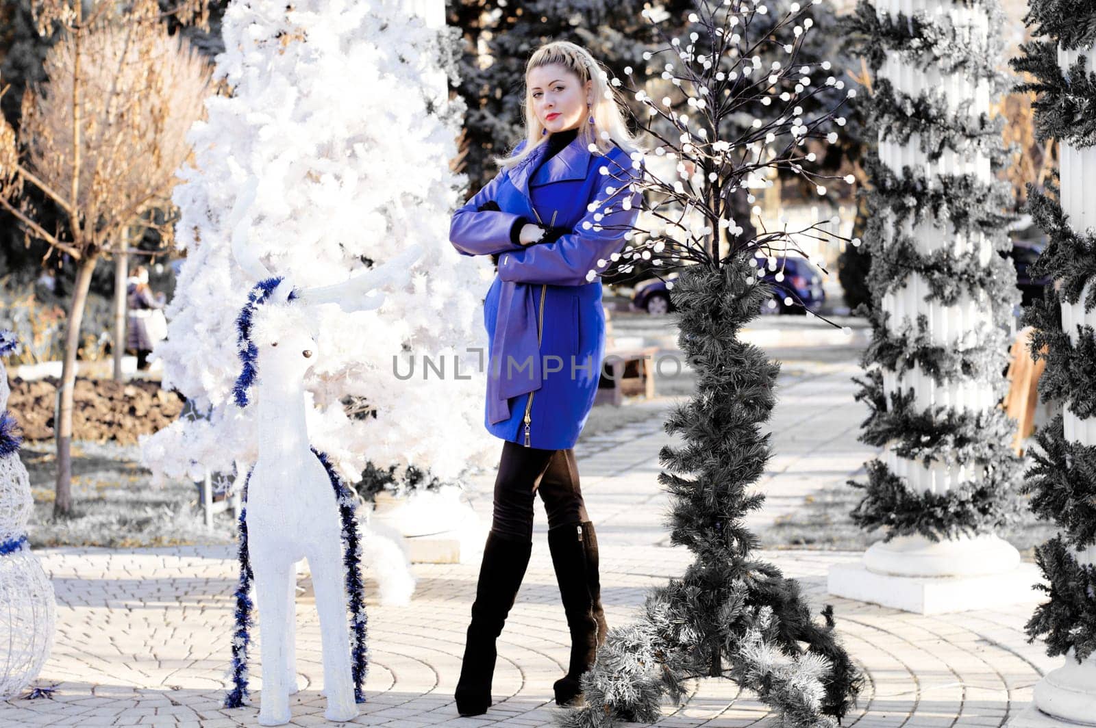 the beautiful woman near a New Year tree, the photo in black-and-white tones, a subject holidays Christmas and New year