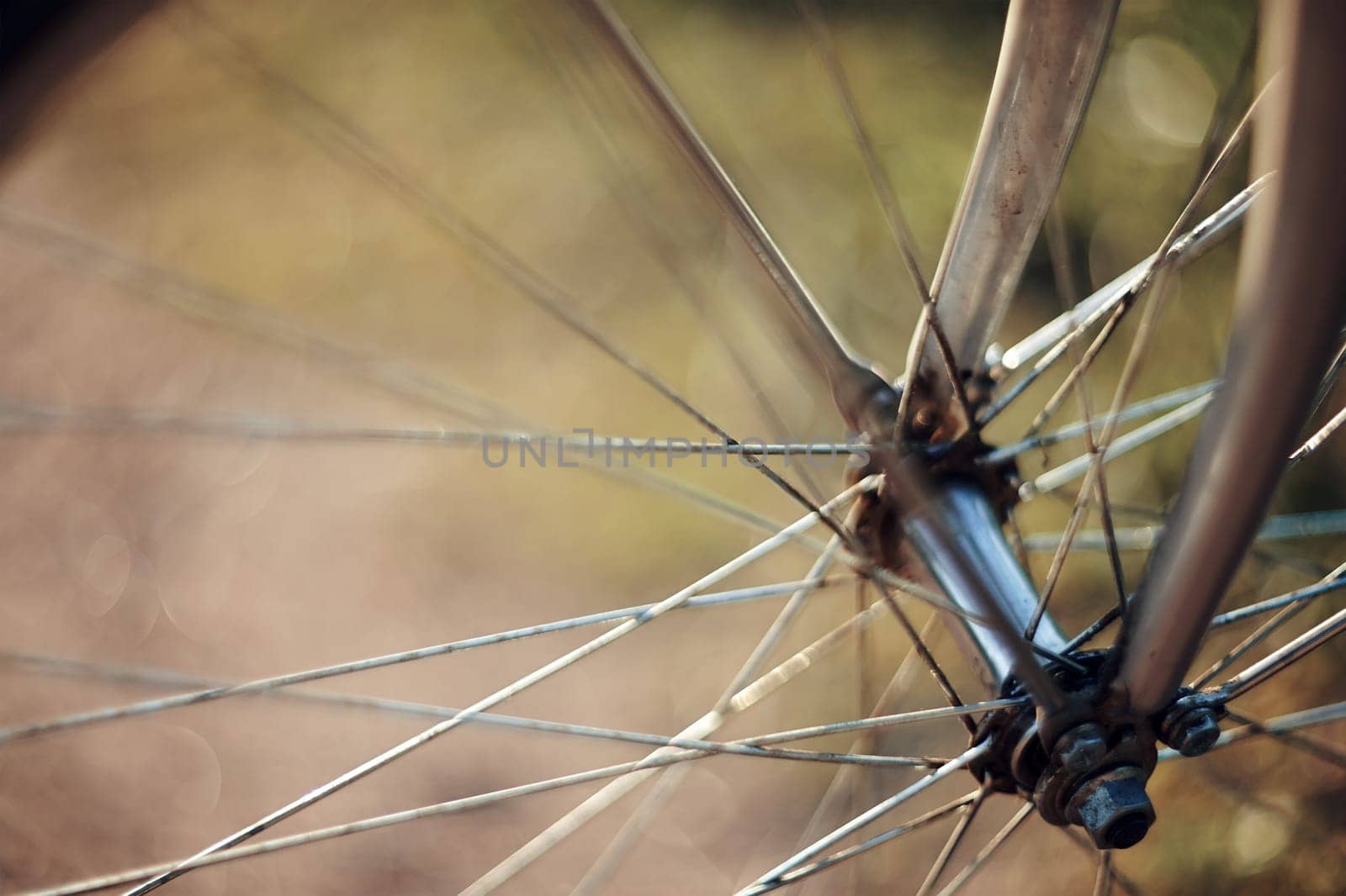 Abstract background with a forward wheel of the bicycle with bokeh