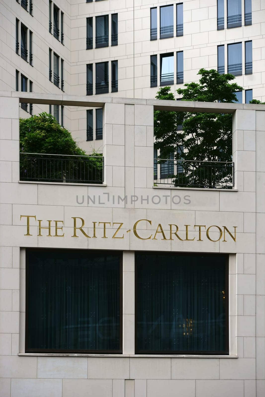 Berlin,Germany - June 21,2016: The distinctively clad or brick façade of the Hotel The Ritz Carlton on Potsdamer Platz with a planted roof terrace on June 21,2016 in Berlin.