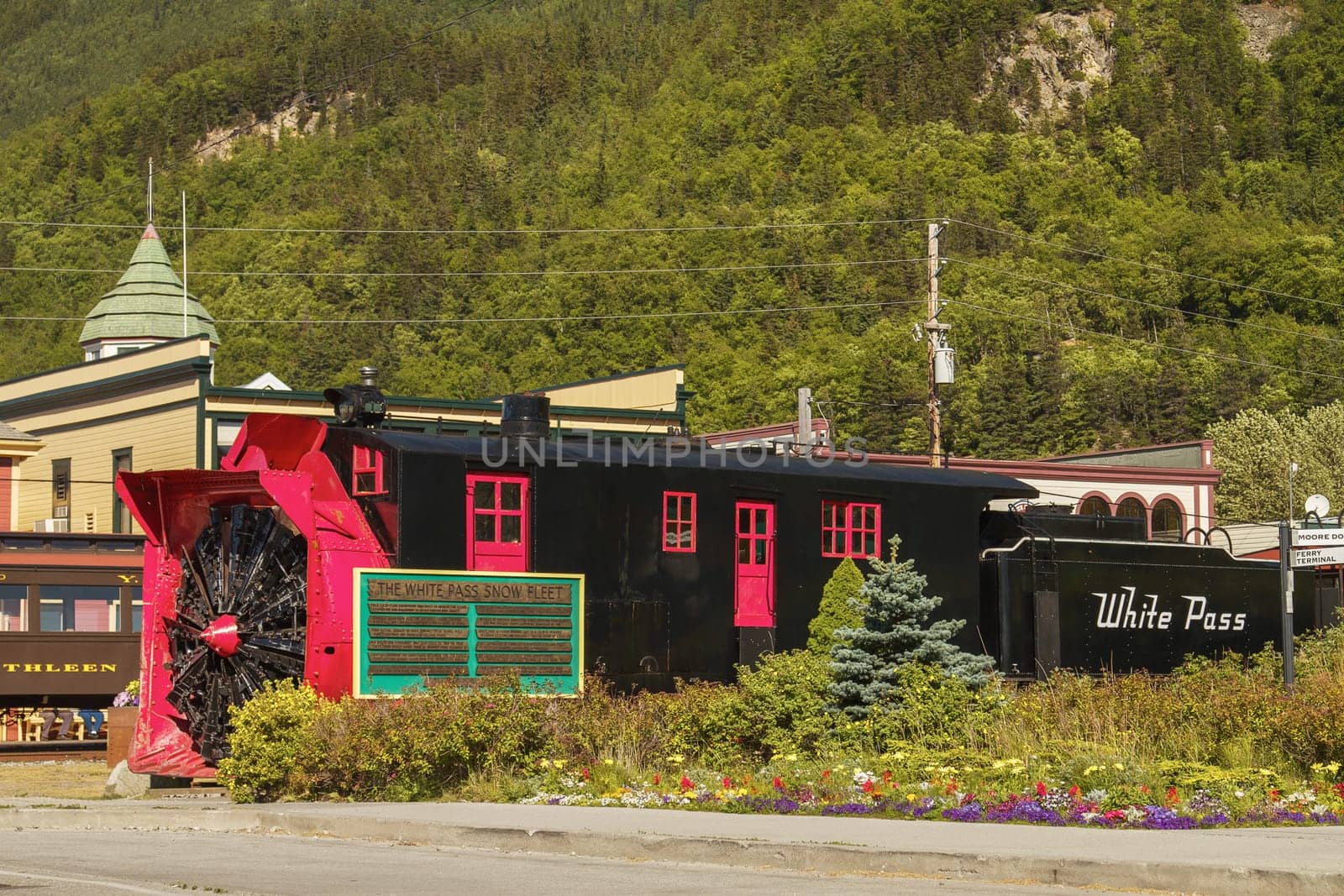 SKAGWAY, ALASKA, USA - JULY 12, 2011: Old Snow Blower Train and Trees in the Background