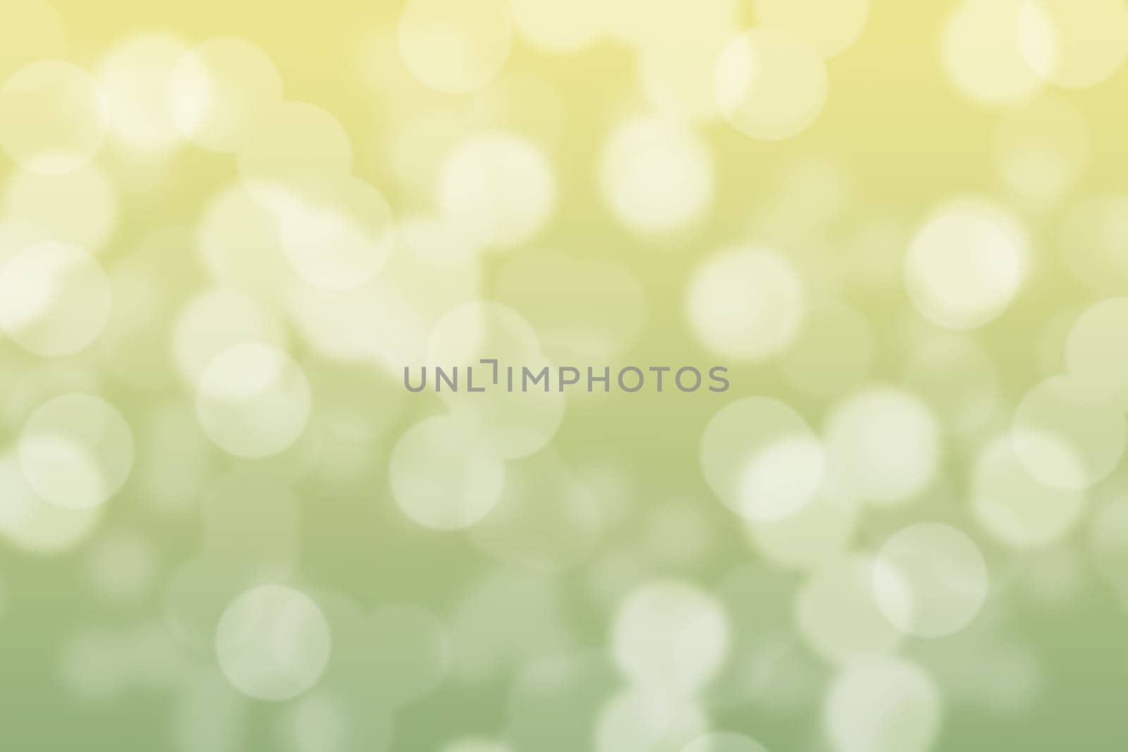 Abstract circular green and soft yellow light bokeh background