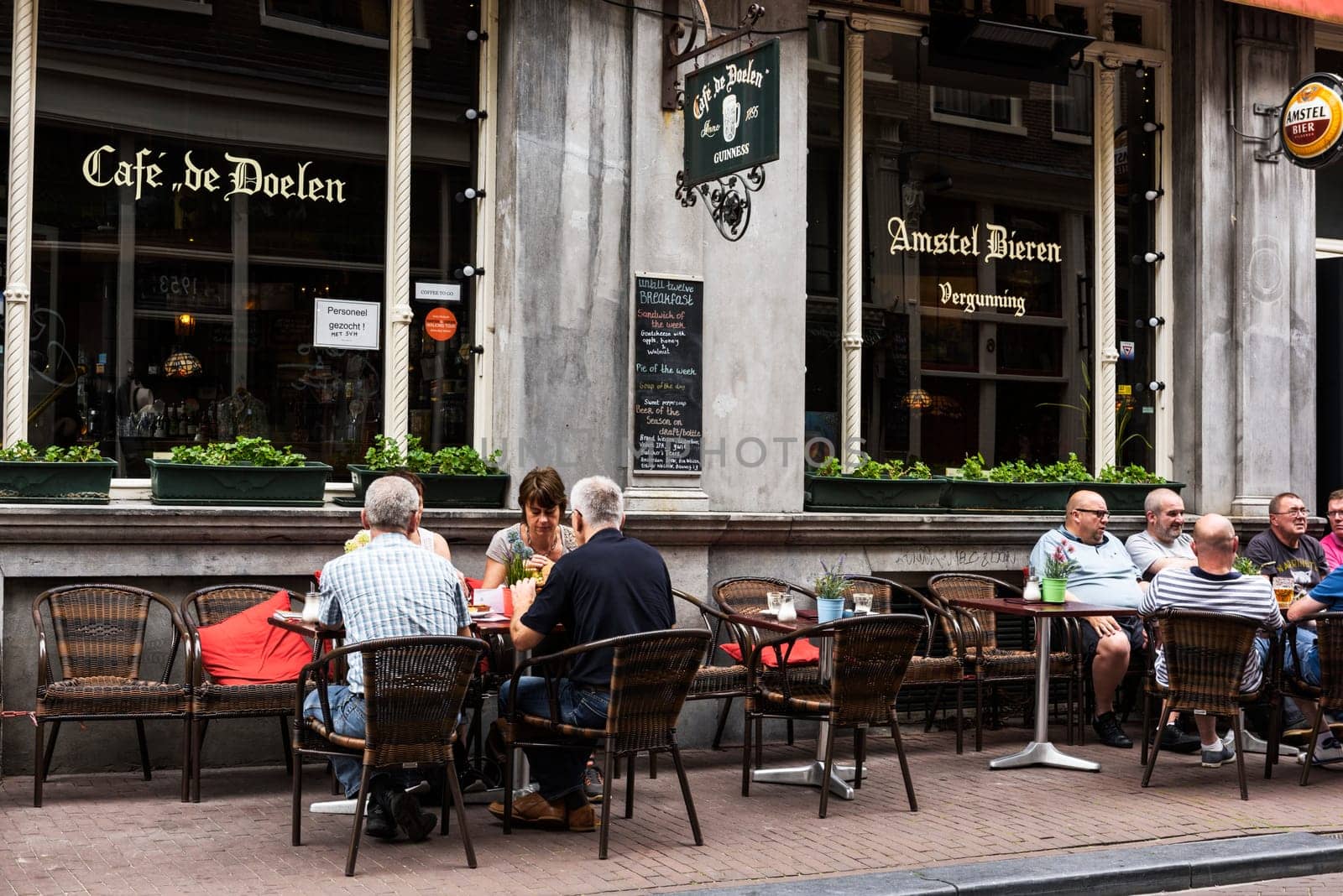 AMSTERDAM, NETHERLANDS, JULLY 9  2016.cafe de doelen in typical district of Amesterdam with people sitting on a terrace, NETHERLANDS
