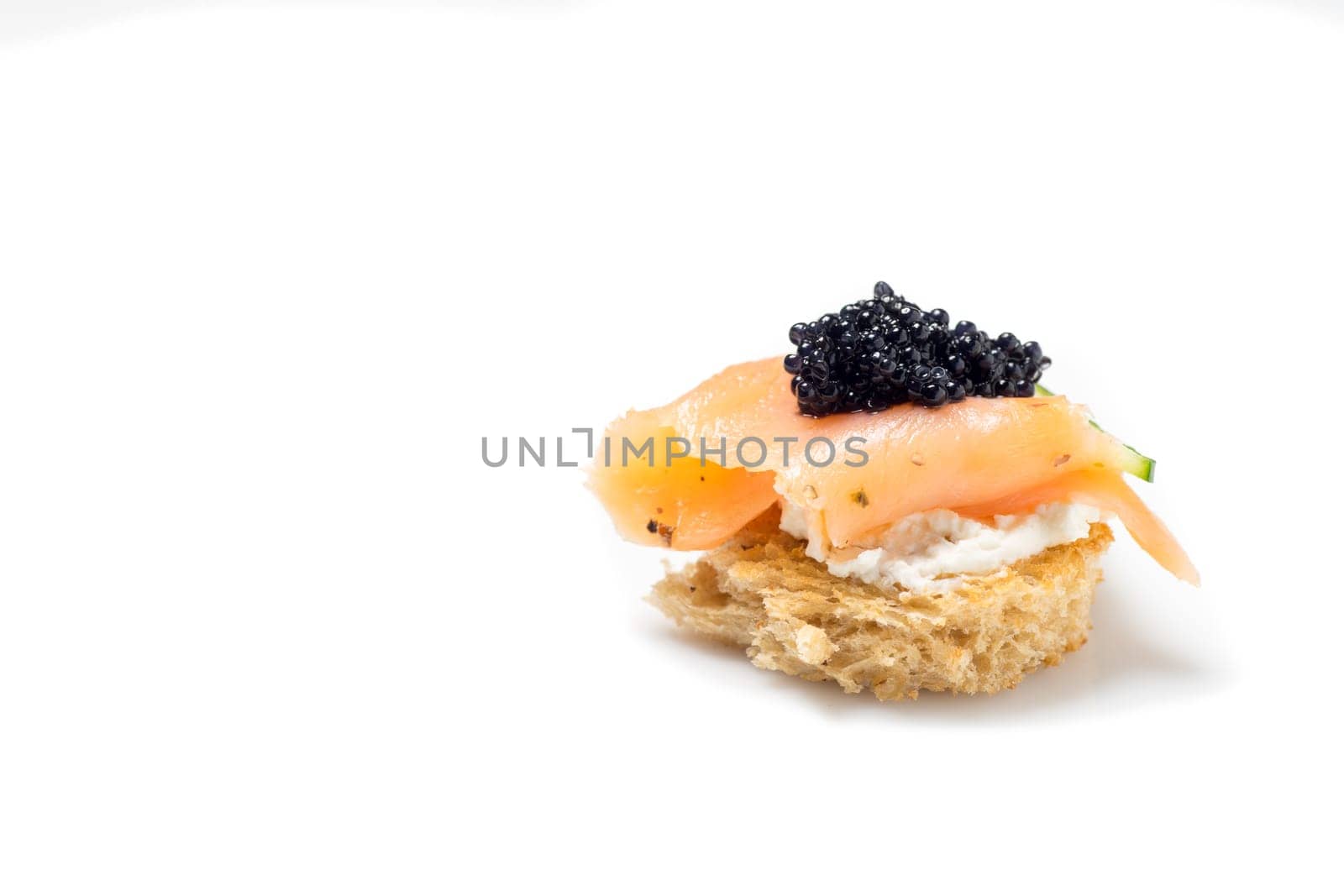 Smoked Salmon Appetizer with Cream Cheese and Caviar, isolated on white