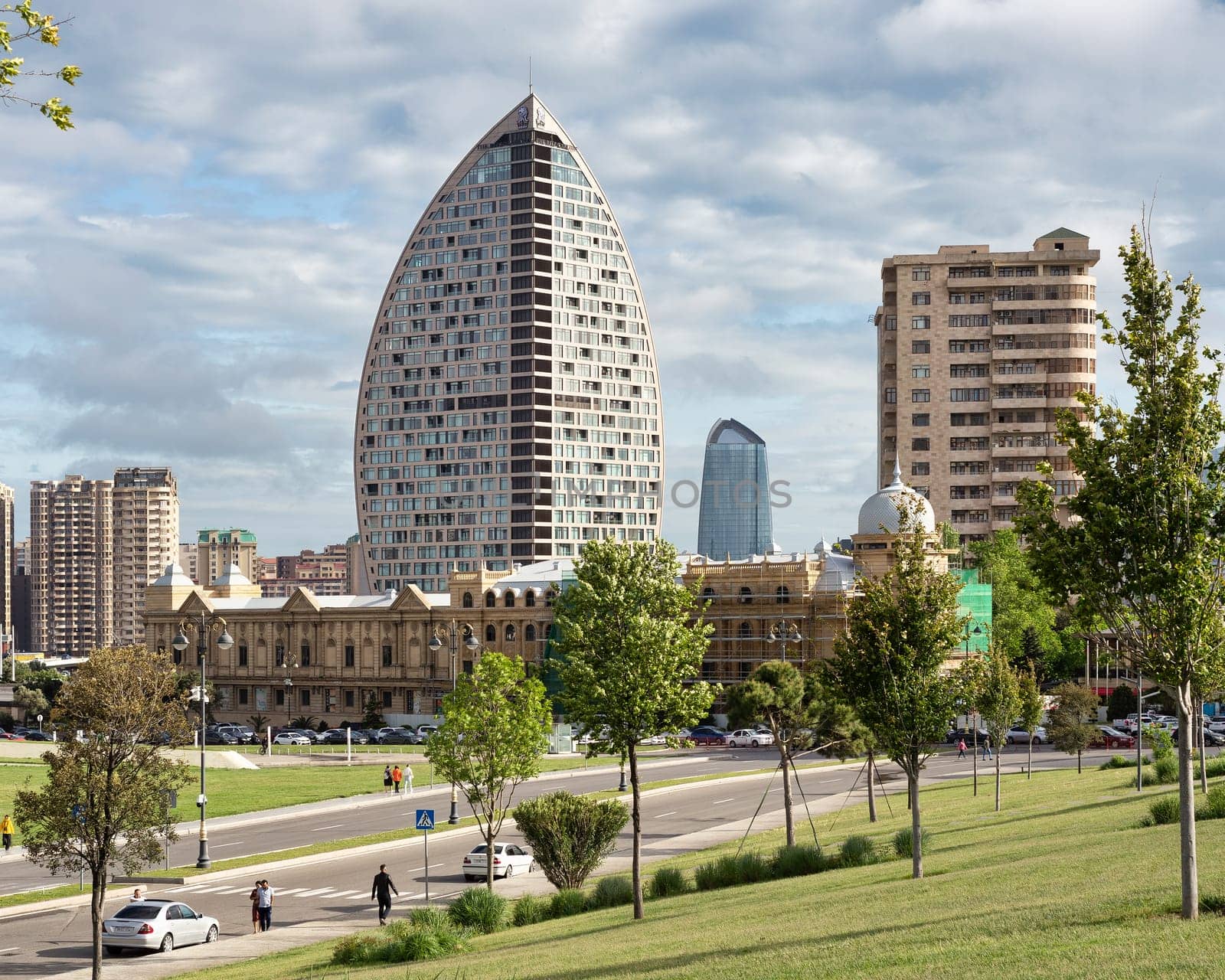 Baku, Azerbaijan - May 7, 2024: A panoramic vista of the city's skyline, prominently featuring the Ritz Carlton Hotel, underscores its distinctive architectural prowess