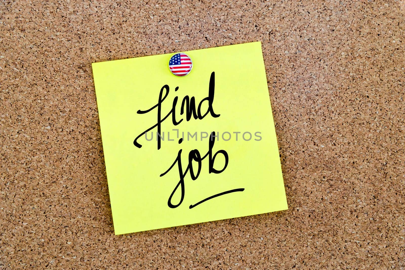 Written text Find Job over yellow paper note pinned on cork board