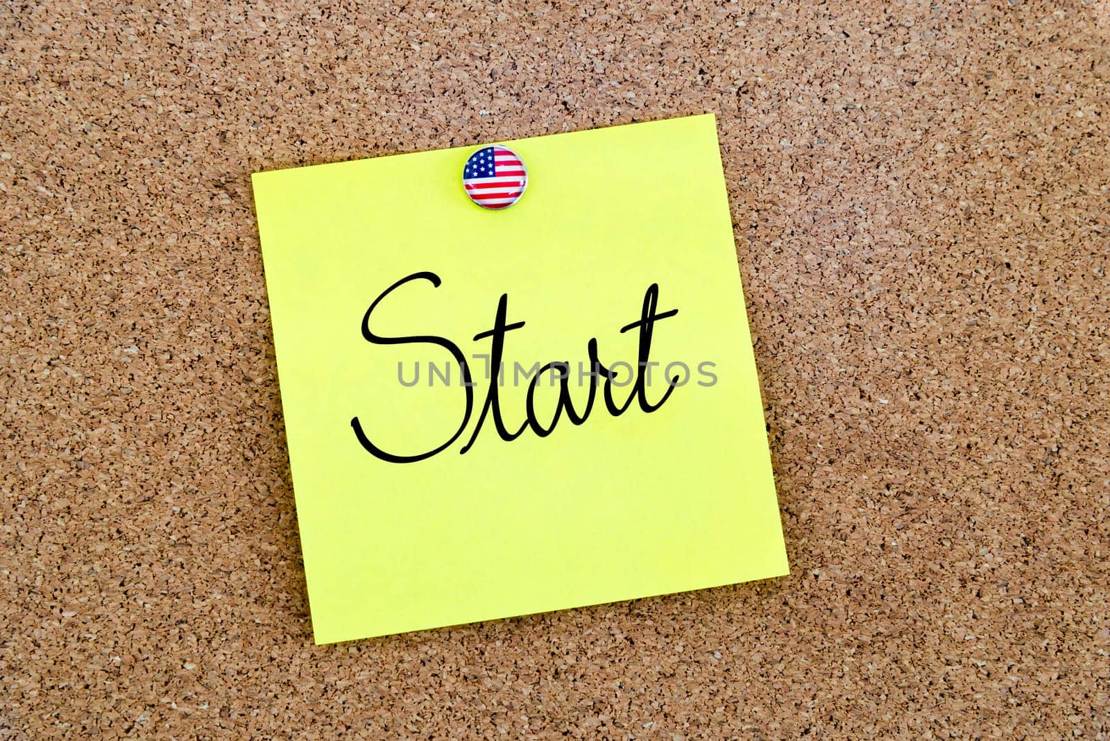 Written text Start over yellow paper note pinned on cork board