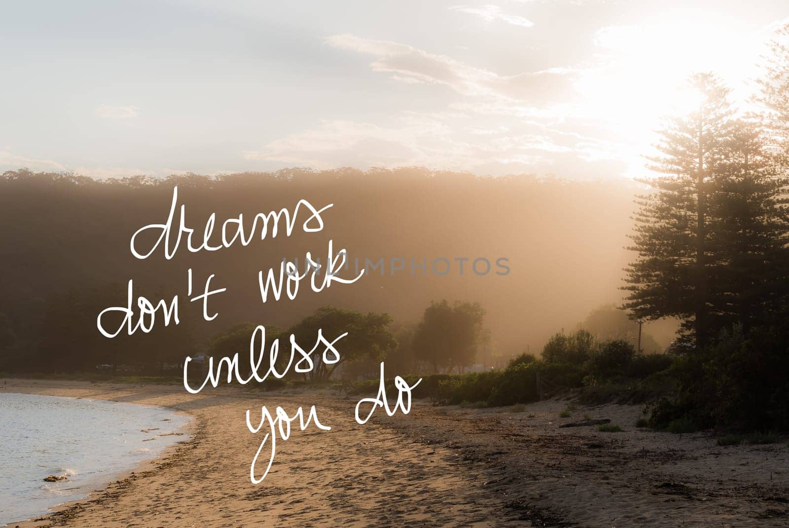 Dreams Do Not Work Unless You Do message. Handwritten motivational text over sunset calm sunny beach background with vintage filter applied