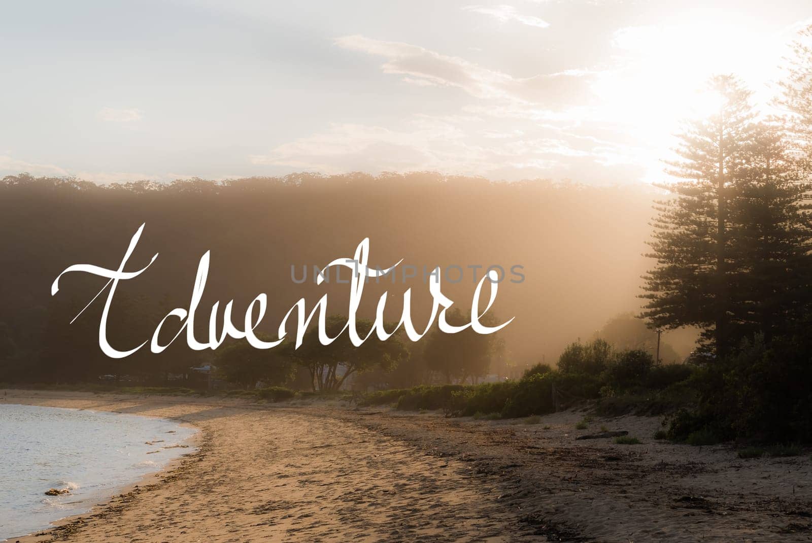 Adventure message. Handwritten motivational text over sunset calm sunny beach background with vintage filter applied