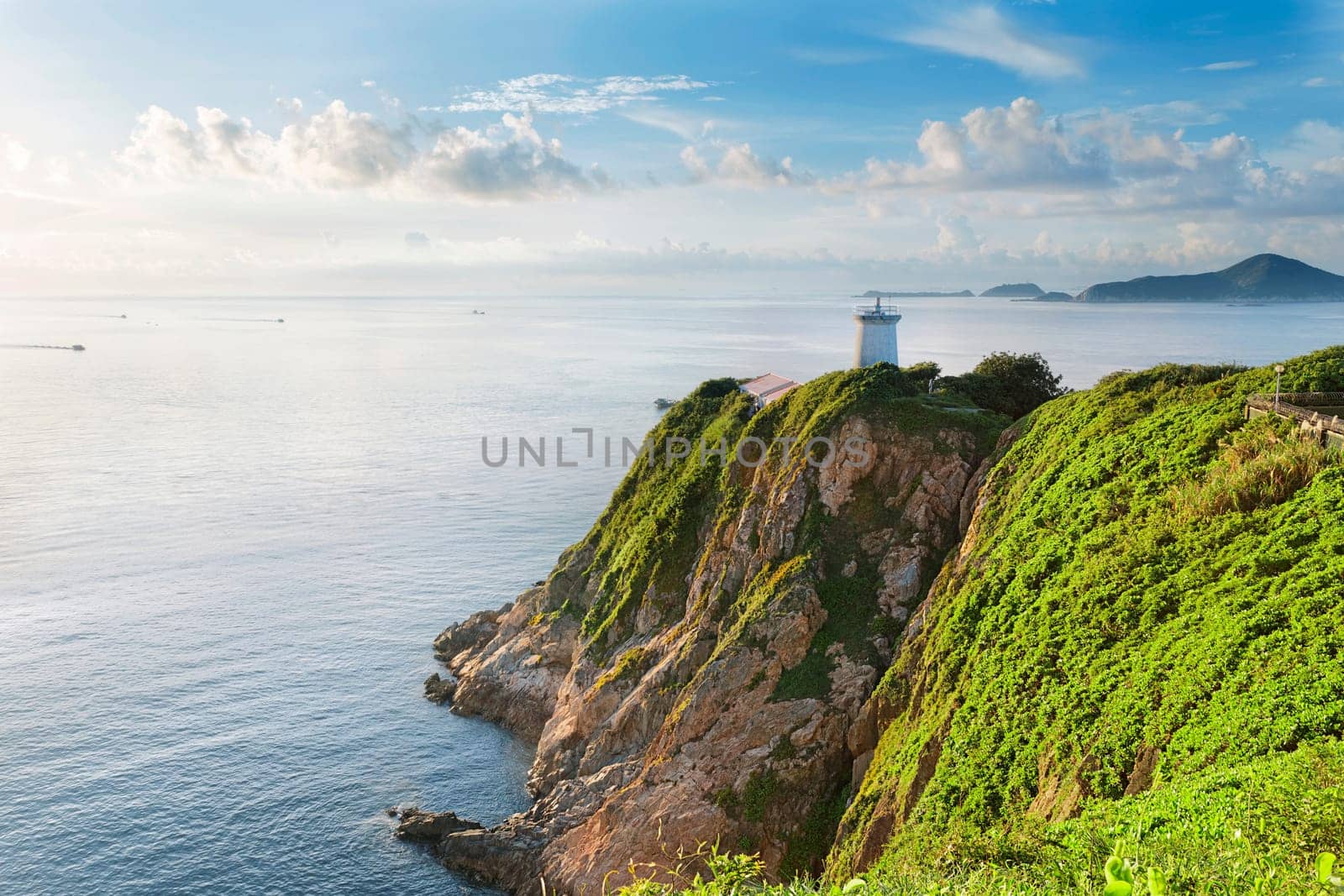 Hong Kong lighthouse during sunrise , Hok Tsui Cape D'Aguilar beautiful landscape
