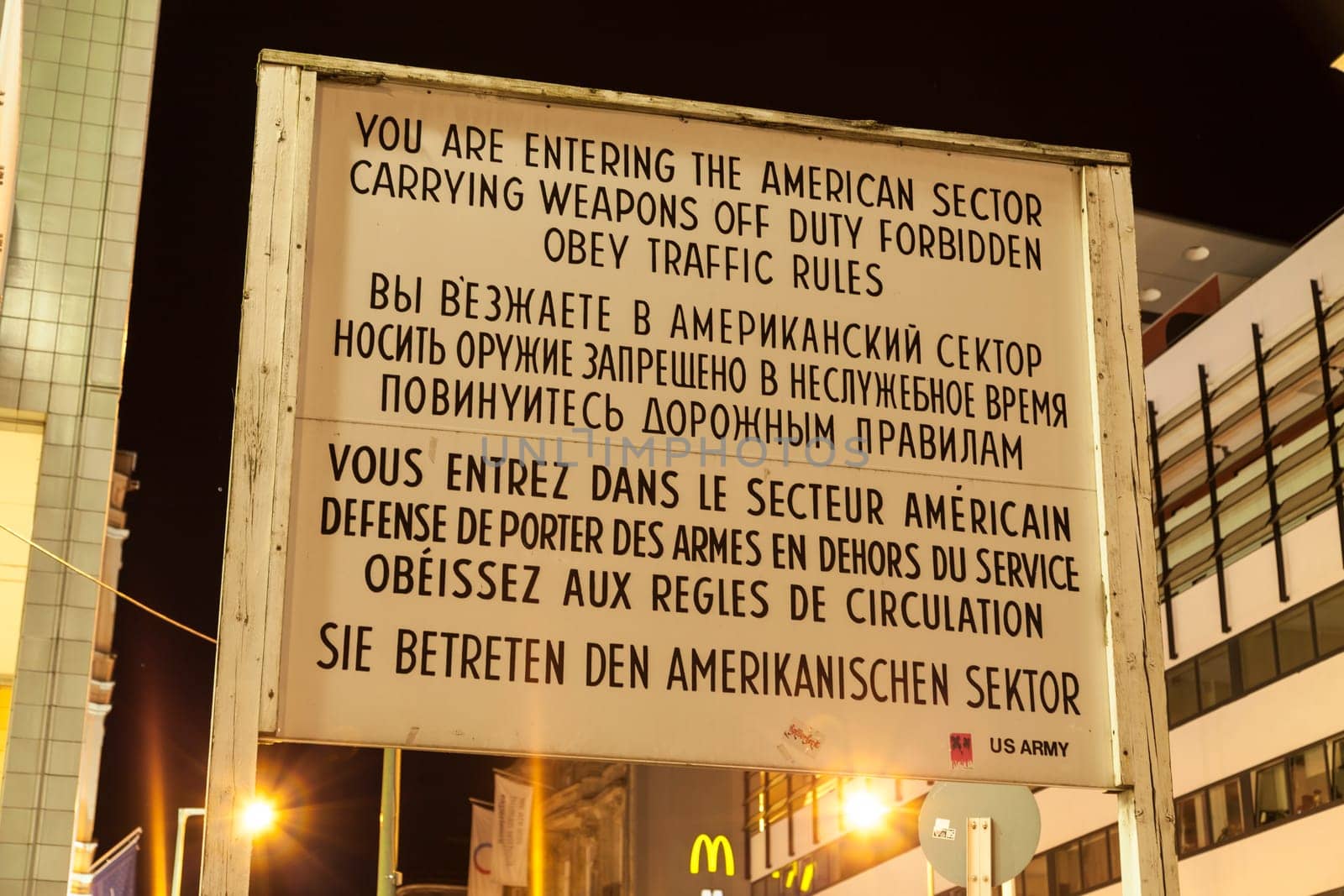 Board at Checkpoint Charlie in Berlin