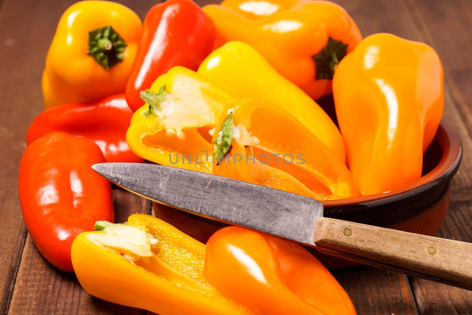 Small bell peppers in red and orange