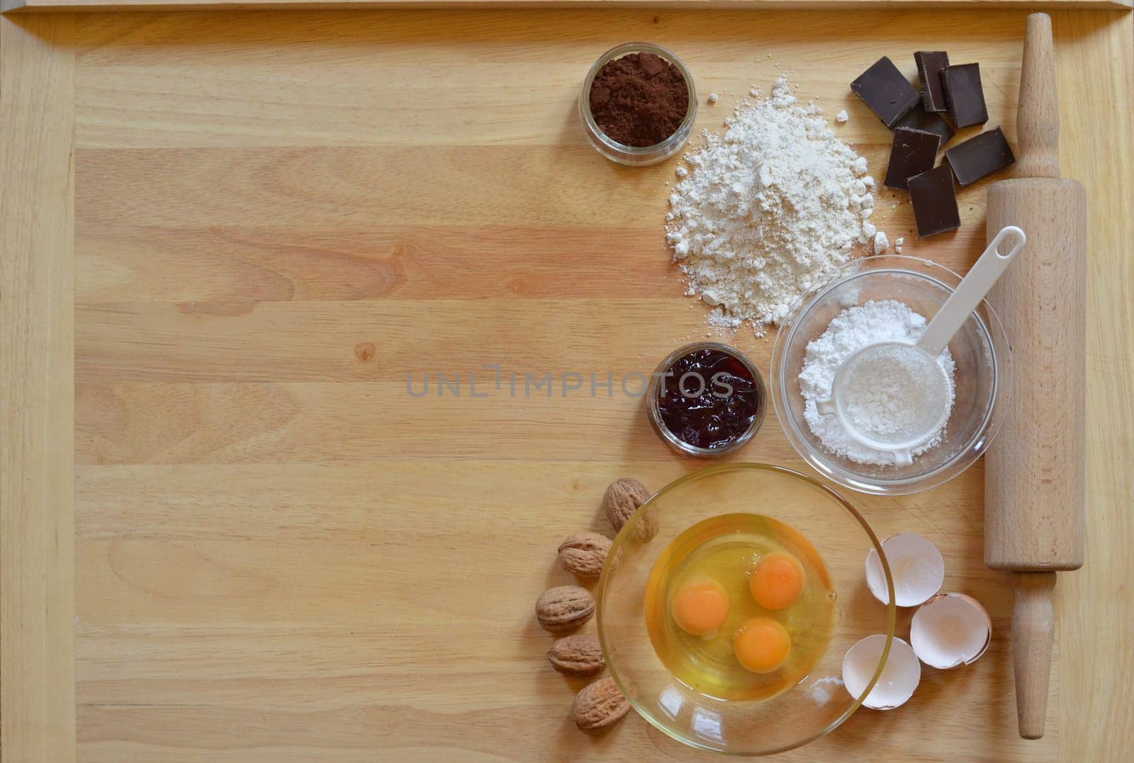 Border of baking ingredients with copy space to the right side