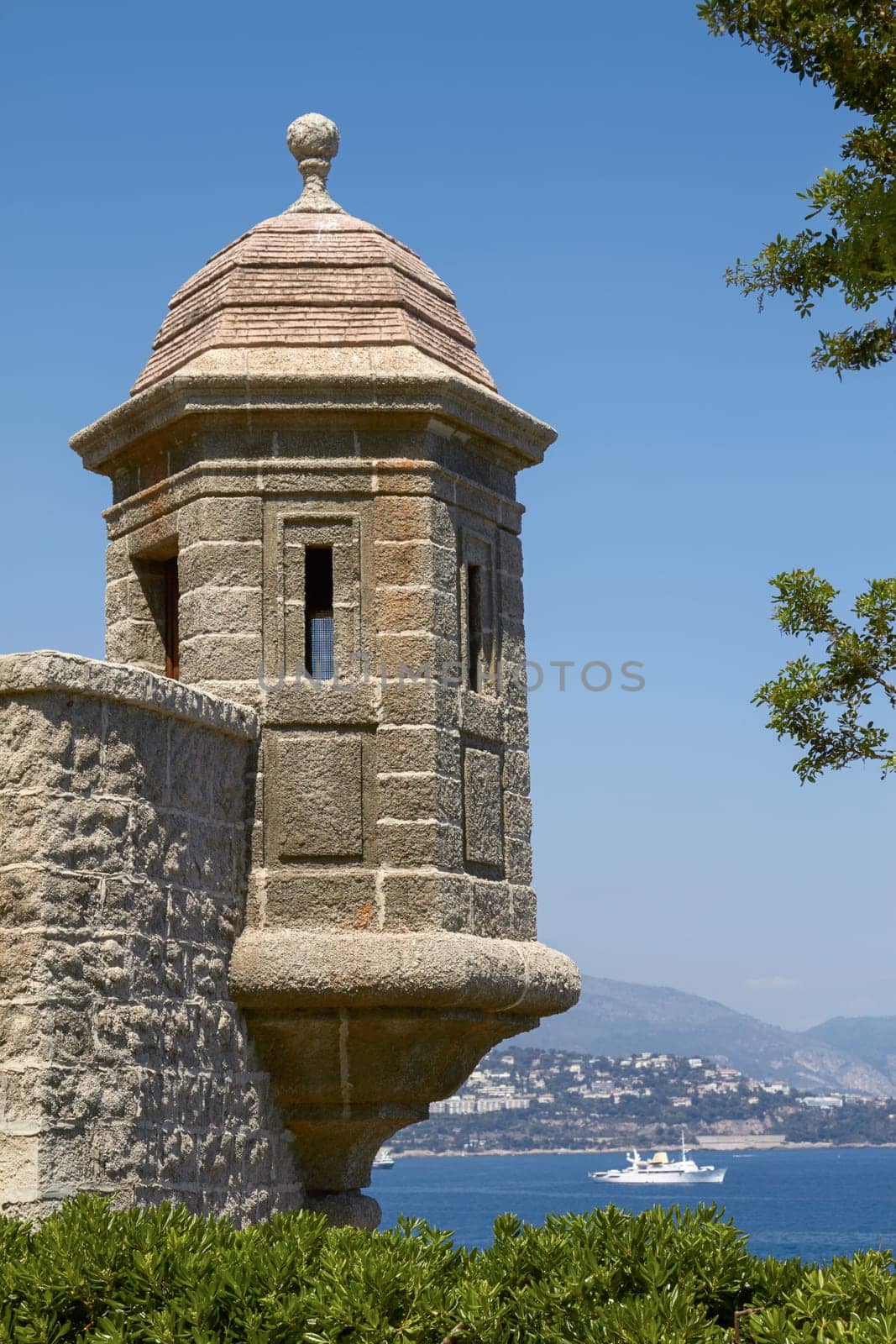 Monte Carlo Palace Wall with Watch Tower Overlooking the Mediterranean Ocean.