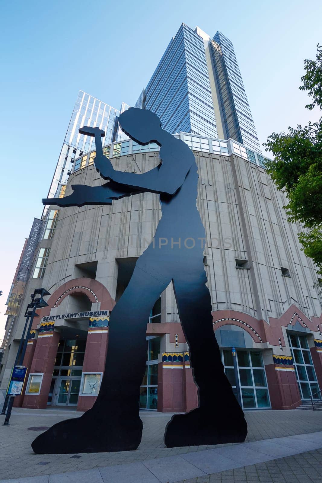 SEATTLE, WASHINGTON, USA - SEPTEMBER 9, 2011: Artwork of "The Hammering Man"" by Jonathan Borofsky, Stands Outside the Seattle Art Museum in Washington, United States."
